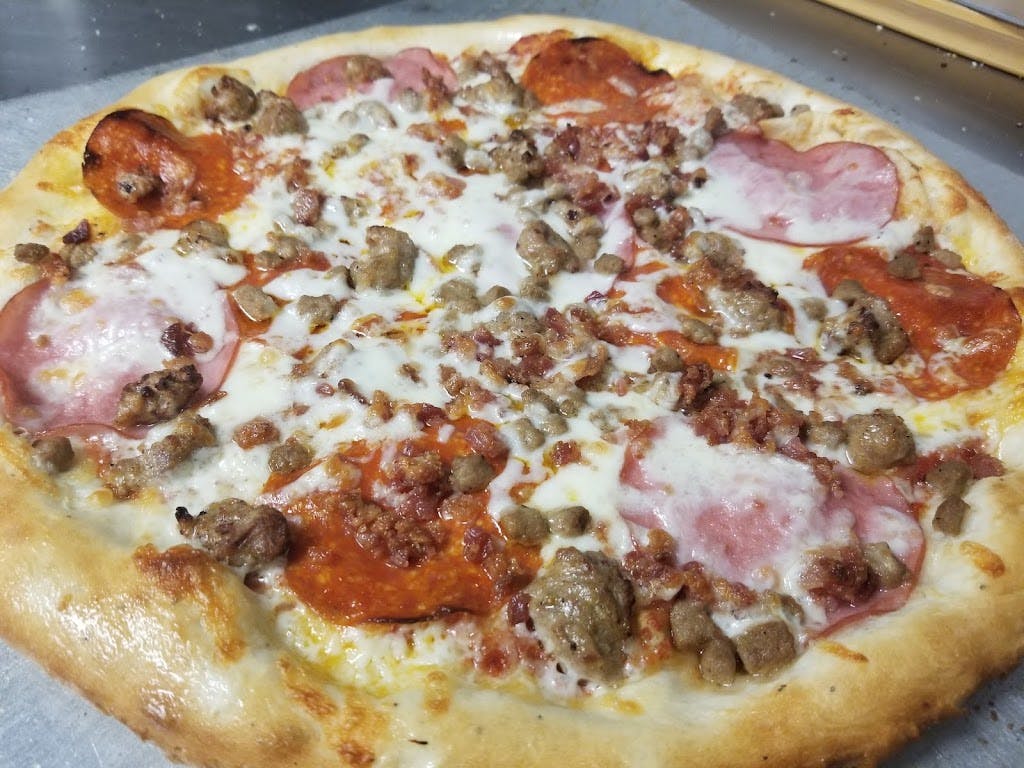 Order Meat Treat Pizza - 14" food online from Stone Oven Downtown store, Wichita Falls on bringmethat.com