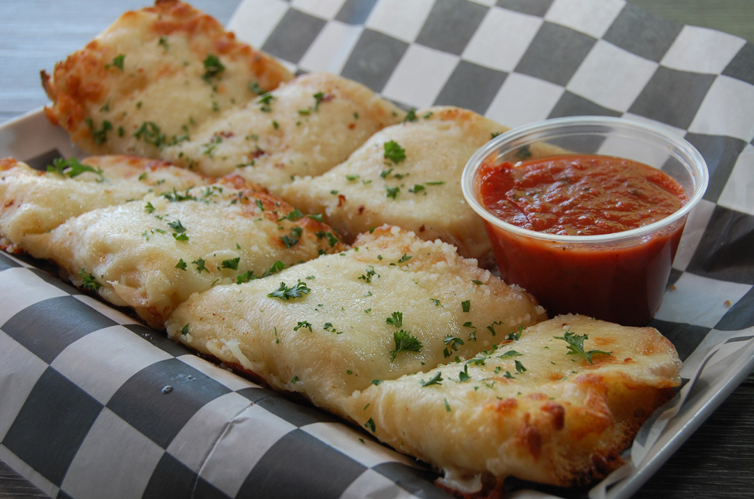 Order Garlic bread with Cheese food online from Jake & Elwood store, Louisville on bringmethat.com