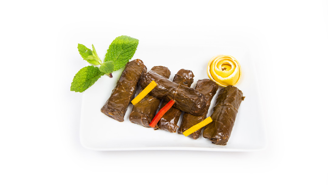 Order Home Made Grape Leaves (6pcs) food online from Fadi Mediterranean Grill store, Katy on bringmethat.com
