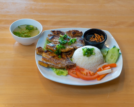 Order C1. Grilled Lemongrass Pork Chops Rice Plate food online from Que Huong store, Plano on bringmethat.com