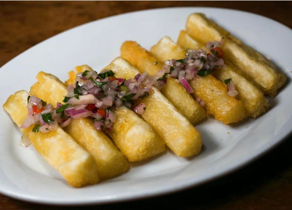 Order YUCA FRITA food online from 90 Miles Cuban Cafe store, Chicago on bringmethat.com