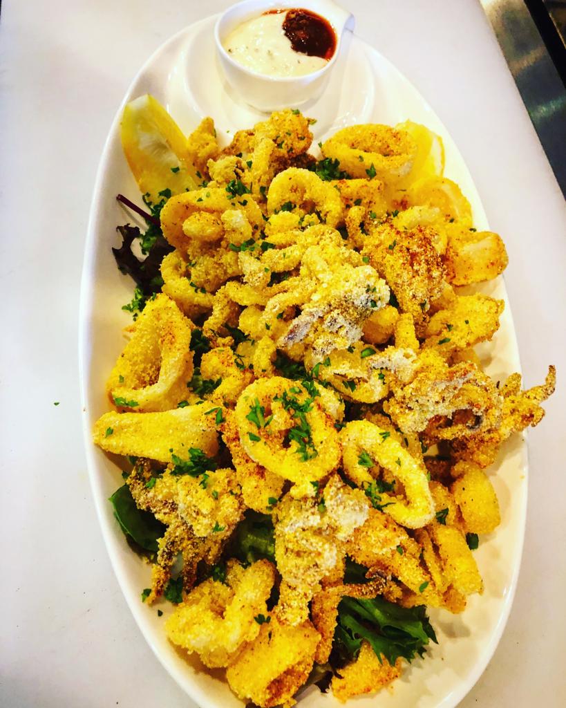 Order Corn Meal Crusted Calamari food online from Moussaka Mediterranean Kitchen store, San Leandro on bringmethat.com