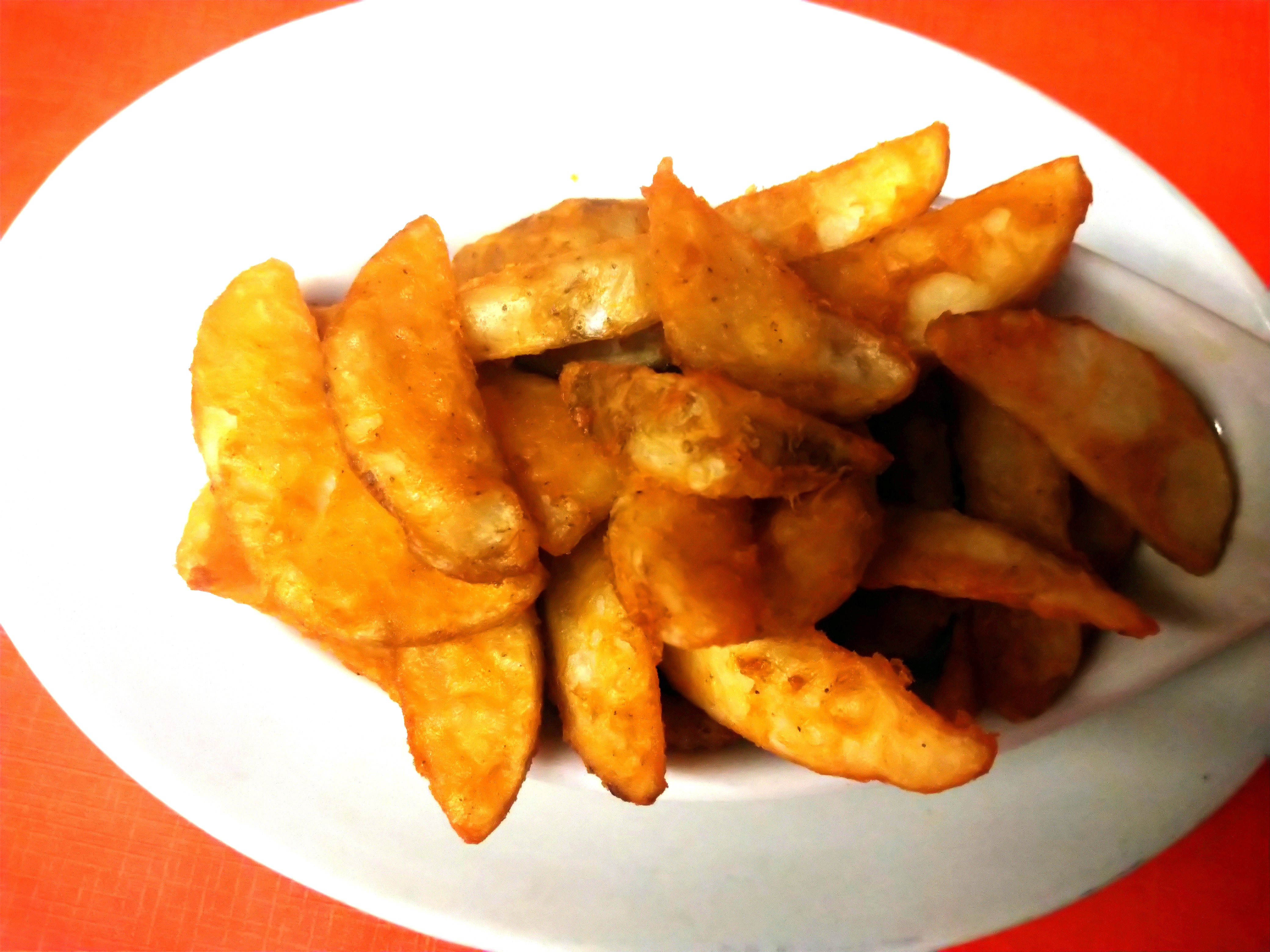 Order Seasoned Wedge Fries food online from Leona's Pizza store, Chicago on bringmethat.com