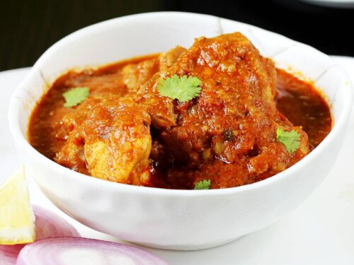 Order Achari Chicken food online from Spice Creations Fine Indian Kitchen store, Allen on bringmethat.com