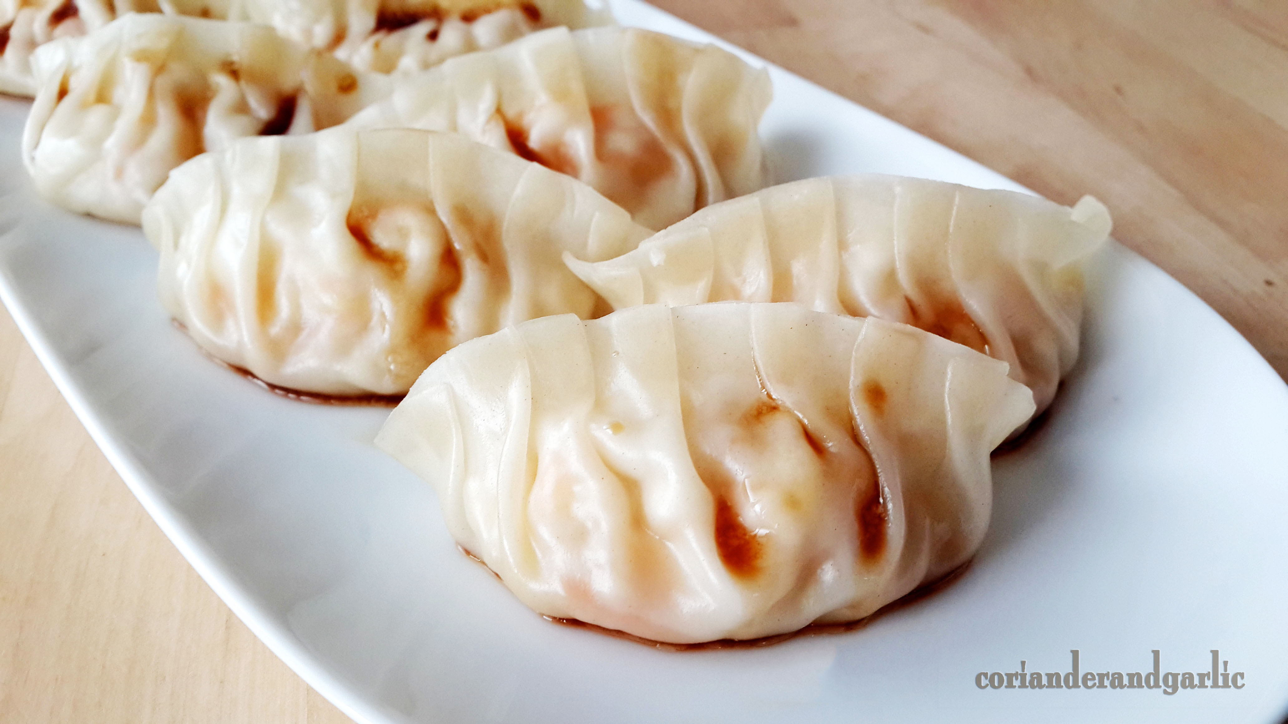 Order A10. Steamed Dumplings food online from Jasmine Chinese & Asian Cafe store, Lone Tree on bringmethat.com