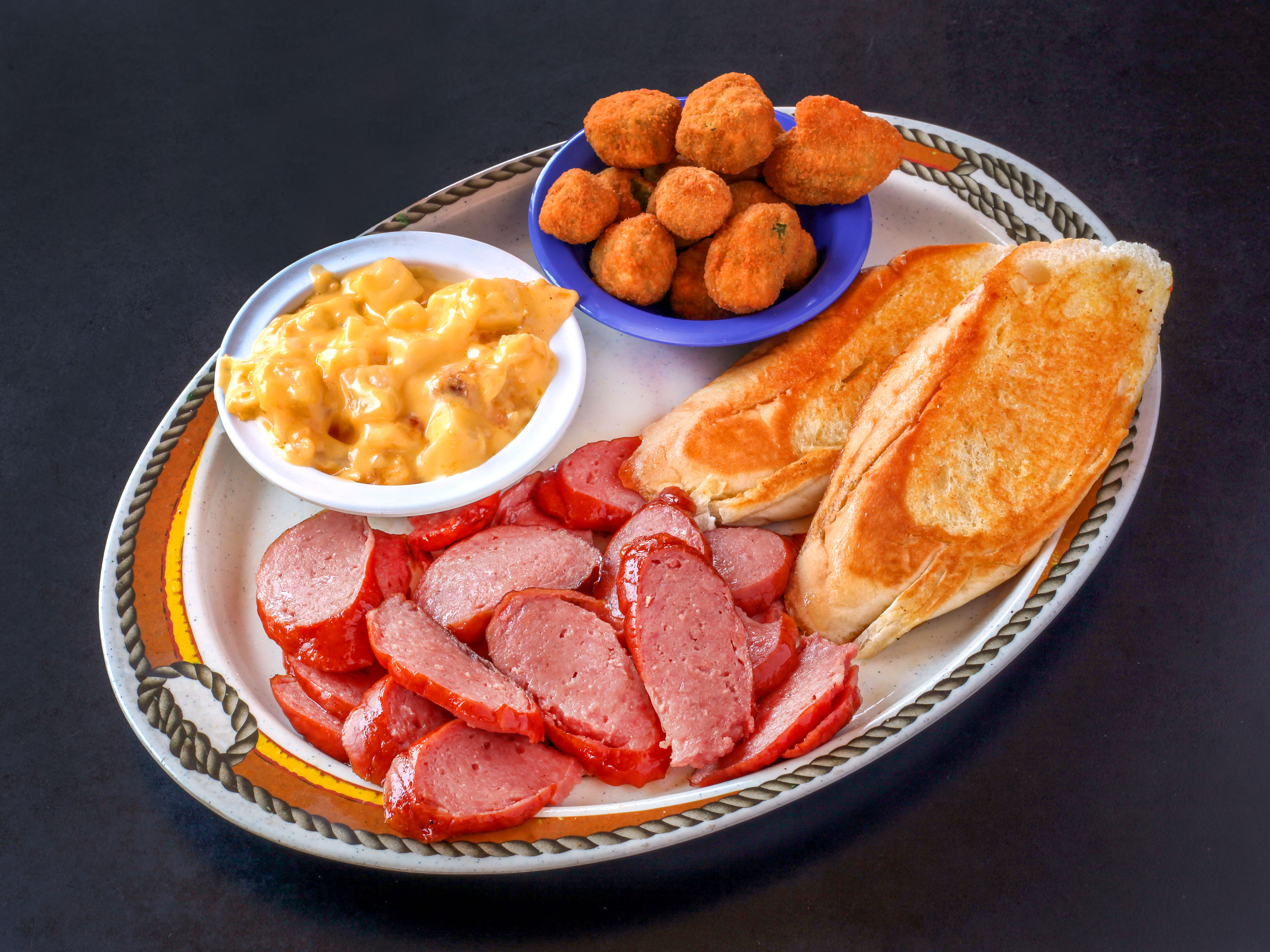 Order 6 oz. Sausage Lunch Plate food online from Smoking Barrels BBQ store, St Louis on bringmethat.com