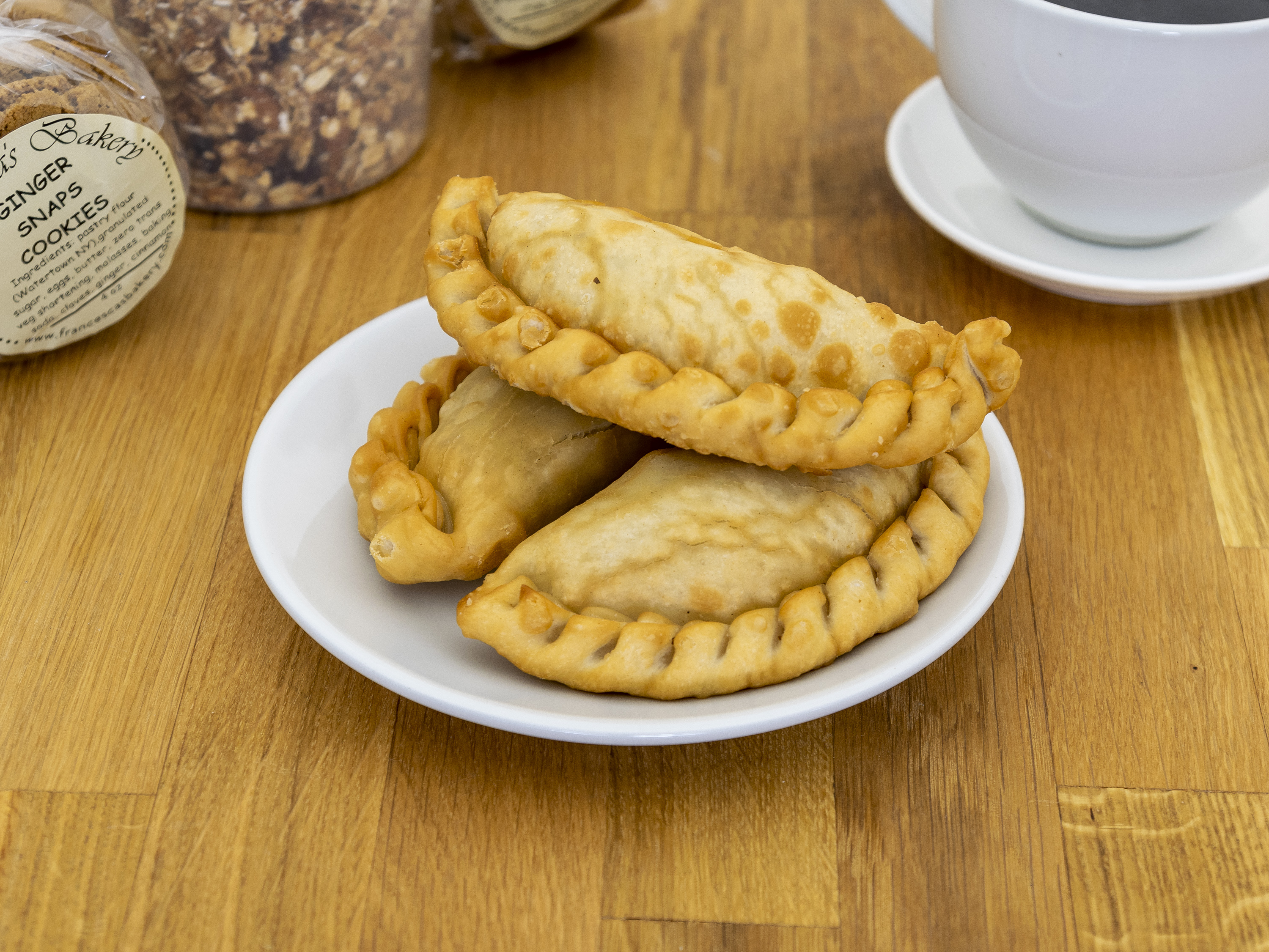 Order Cheese and Green Olives Empanada food online from Francesca Bakery store, Pequannock Township on bringmethat.com