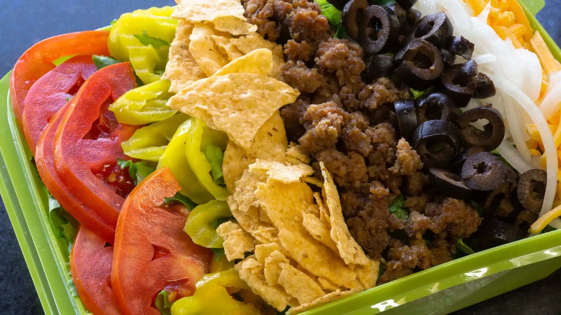 Order Taco Salad - Salad food online from Tubby's Grilled Submarines store, Westland on bringmethat.com