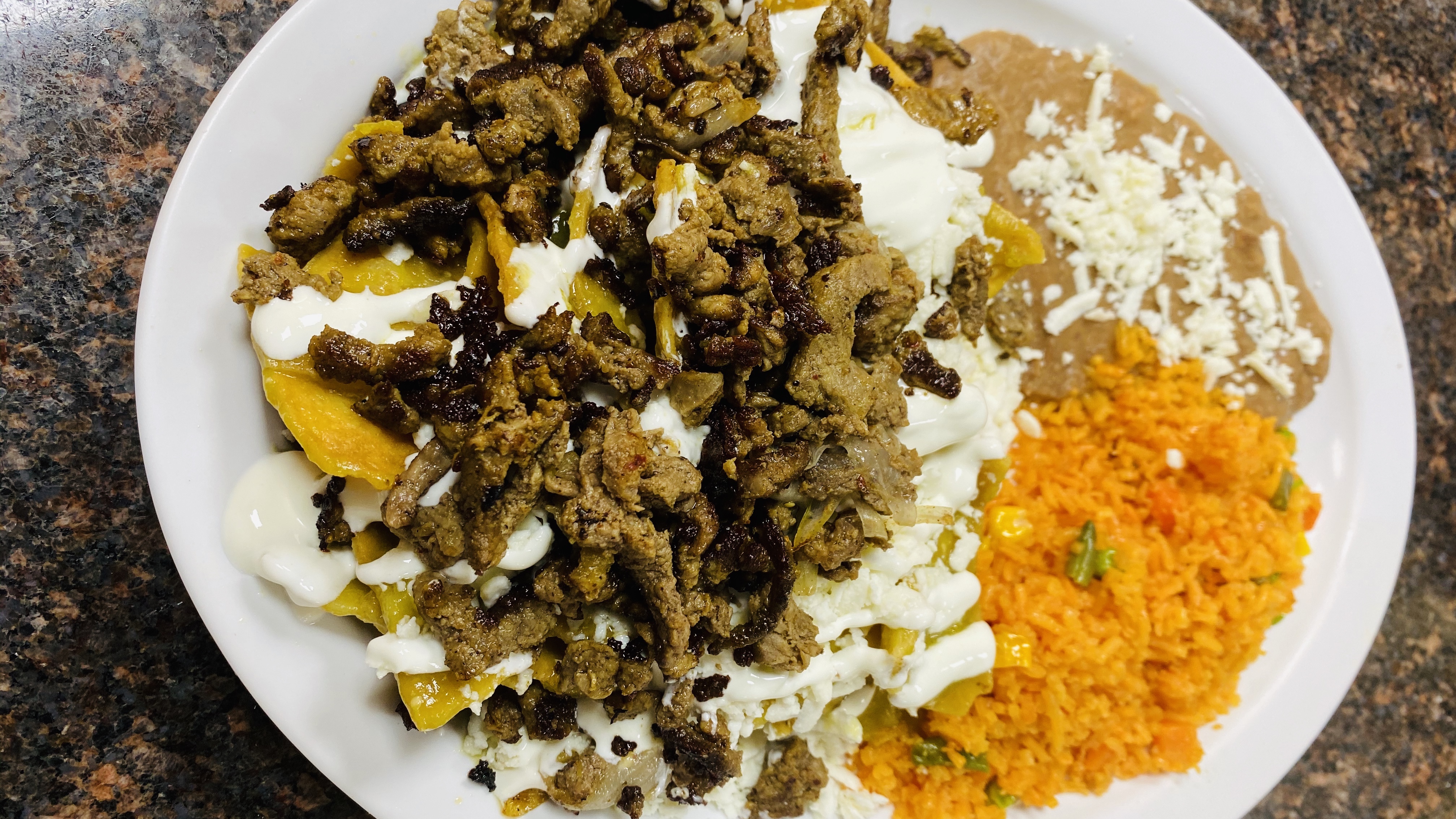 Order Chilaquiles with Beef food online from Dona Tere Westheimer store, Houston on bringmethat.com