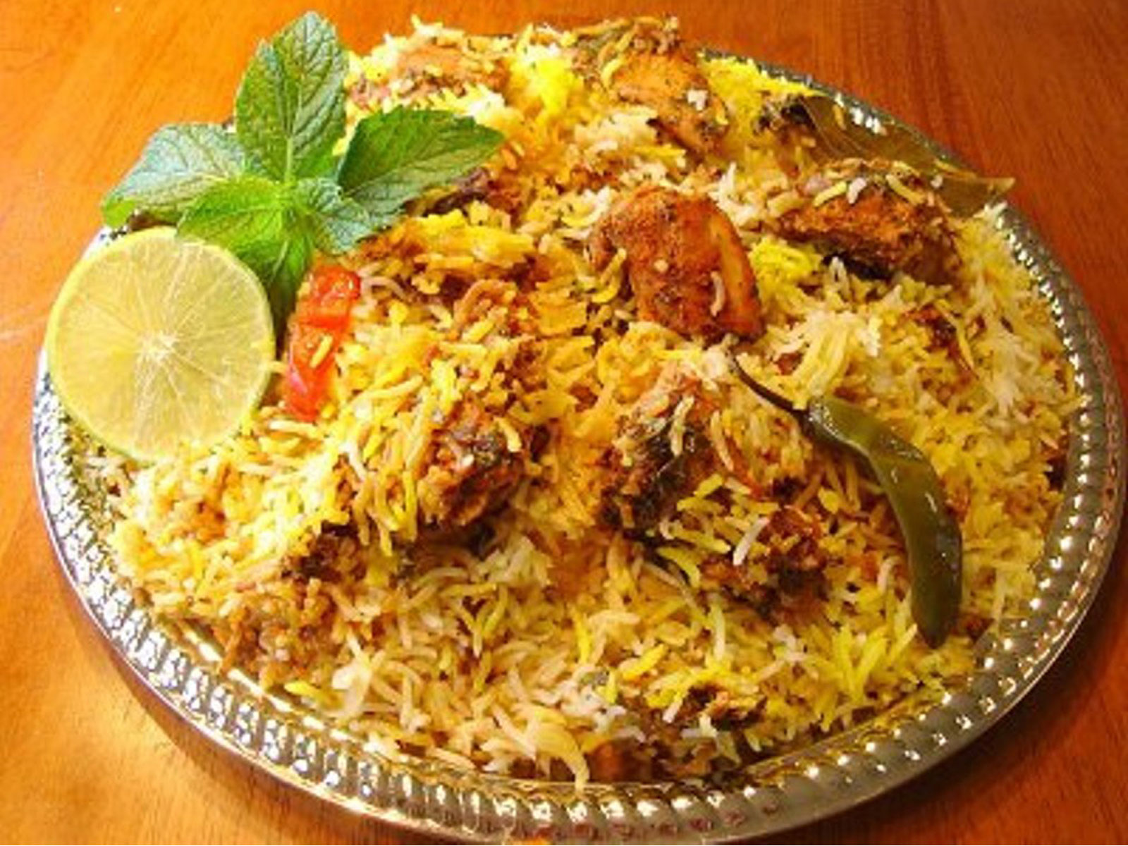 Order Chicken Biryani food online from India's Grill store, Los Angeles on bringmethat.com