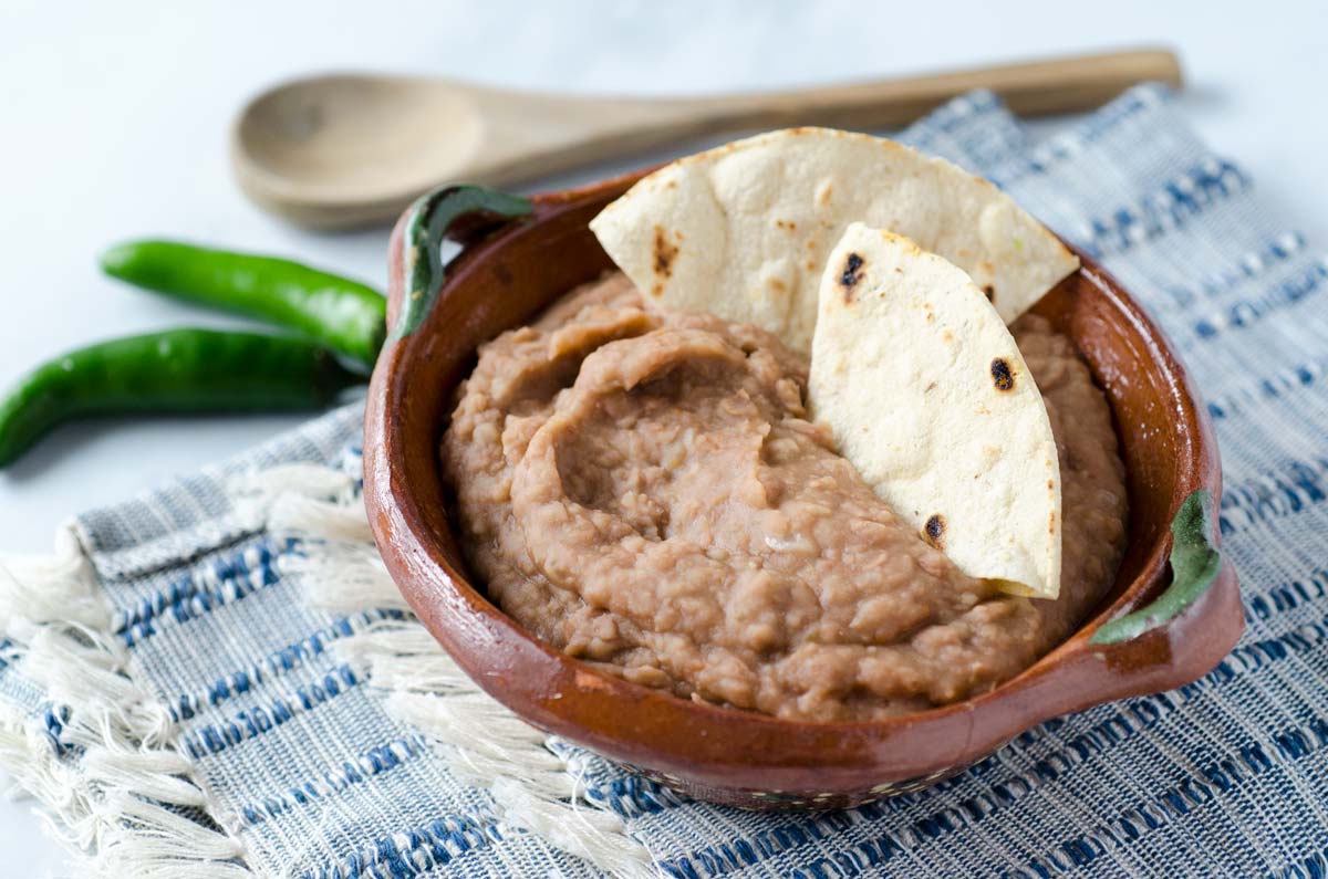 Order Refried Beans food online from Tacos Tolteca store, Baltimore on bringmethat.com