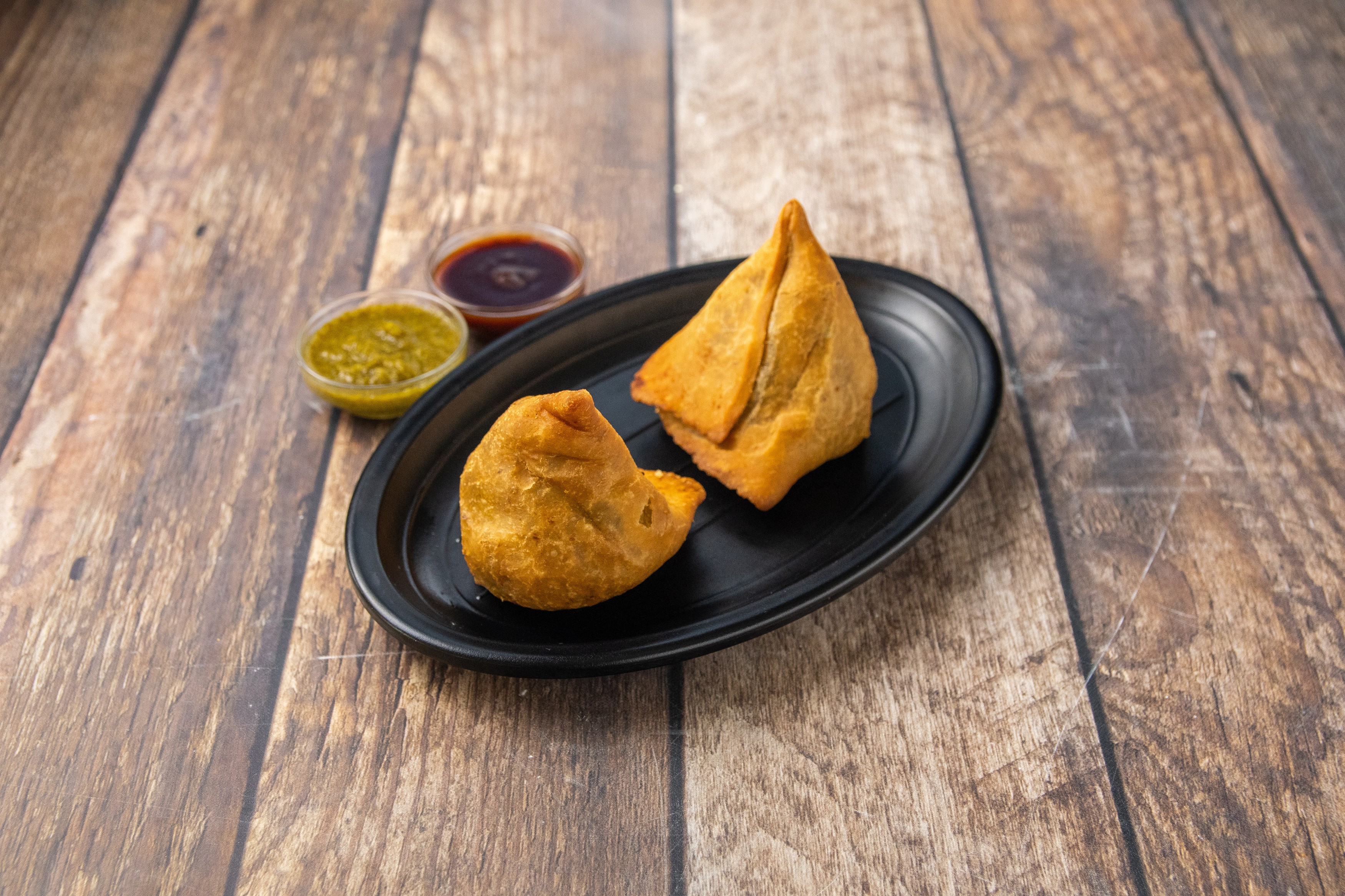 Order 6. Vegetable Samosa food online from Raj Indian Cuisine store, Oakland on bringmethat.com