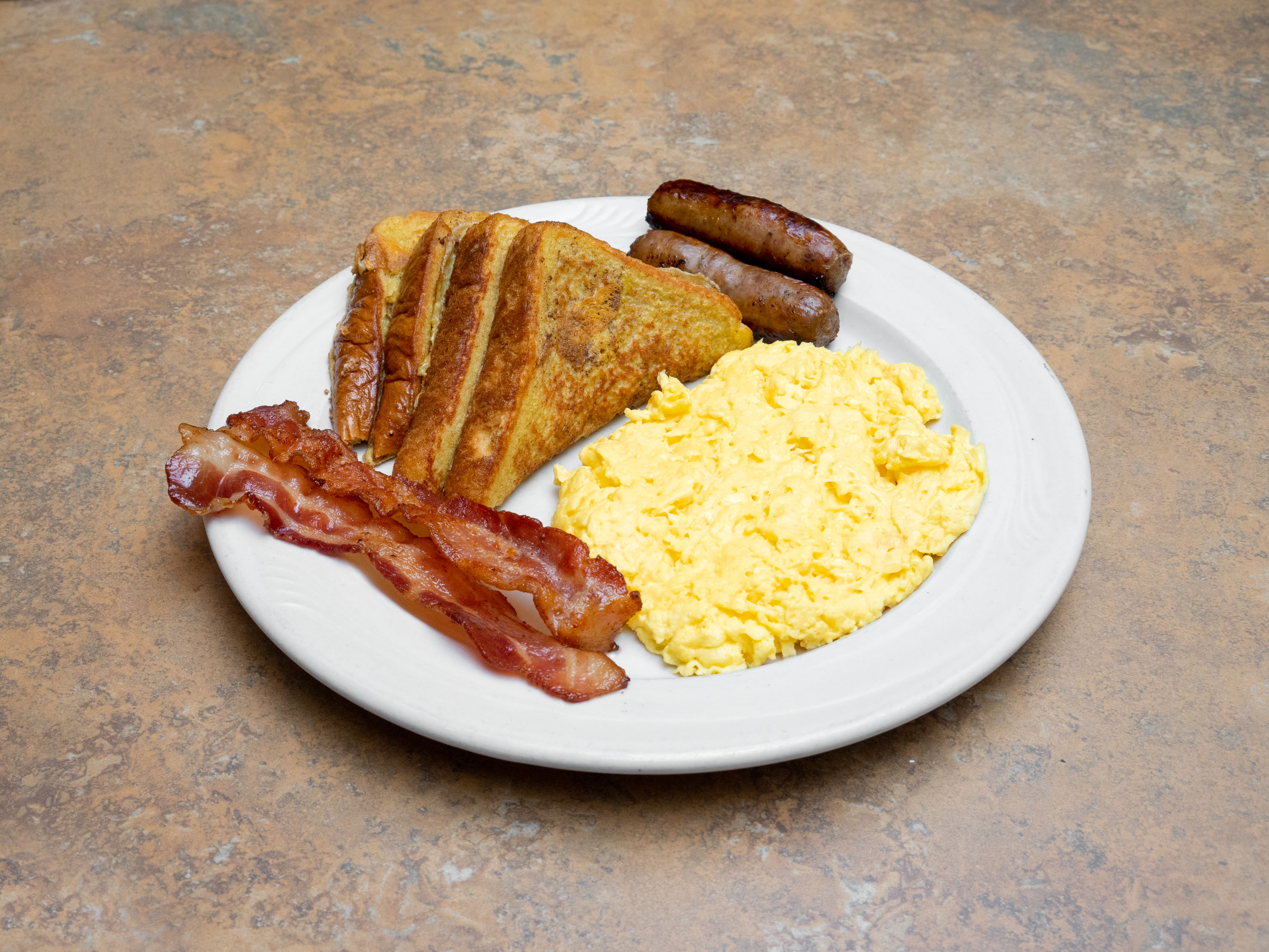 Order French Toast Hash Brown Combo food online from Les Cafe Pancake House store, Highland on bringmethat.com