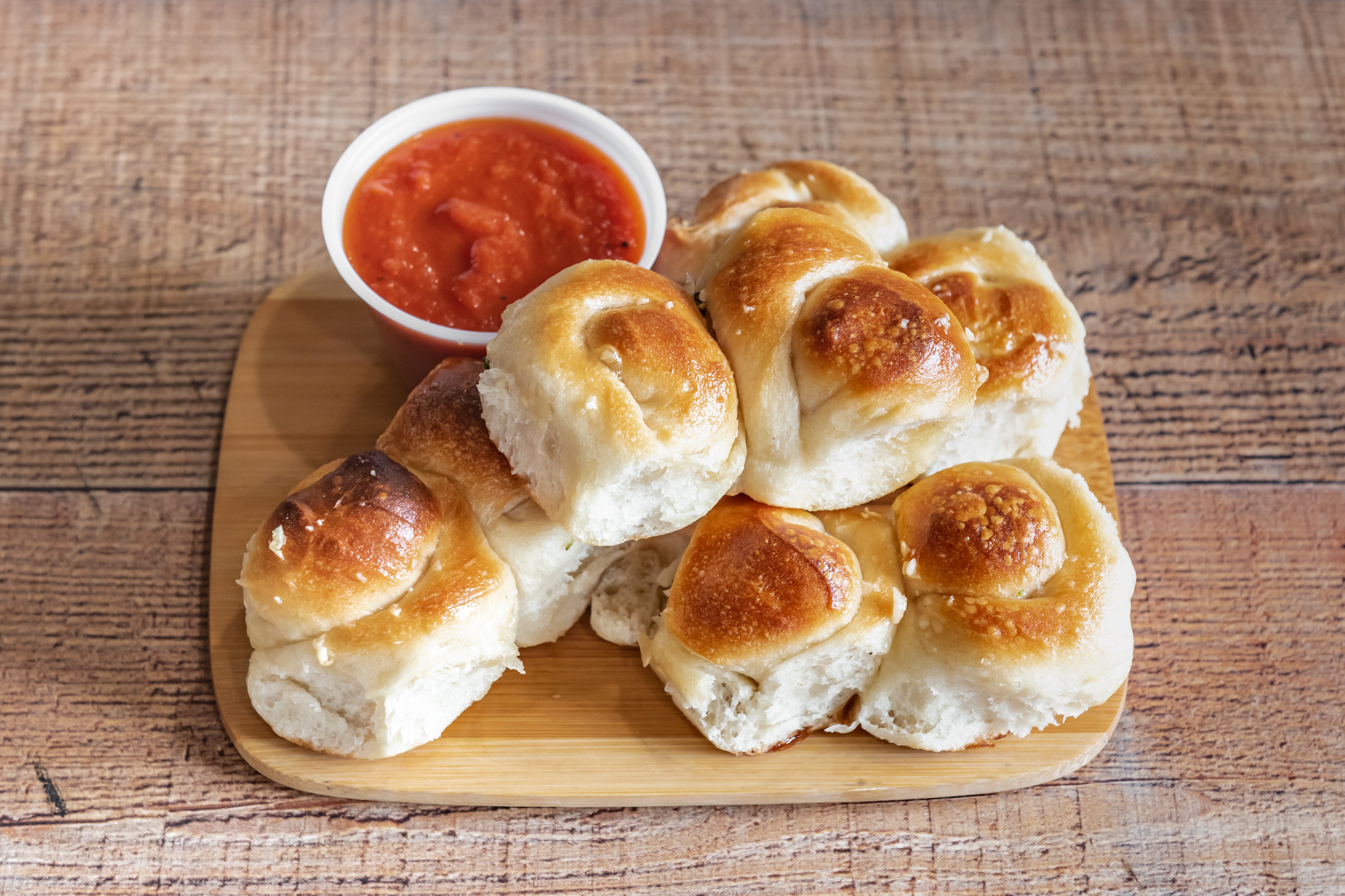 Order Garlic Knots - Side food online from Ray's Famous Pizza store, Allentown on bringmethat.com