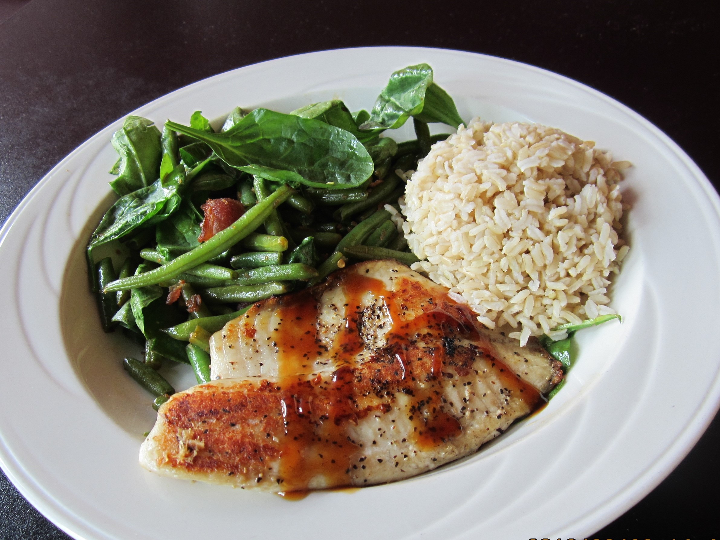 Order Chef's Special Grilled Cajun Fish food online from Bamboo Bistro Westgate store, Austin on bringmethat.com