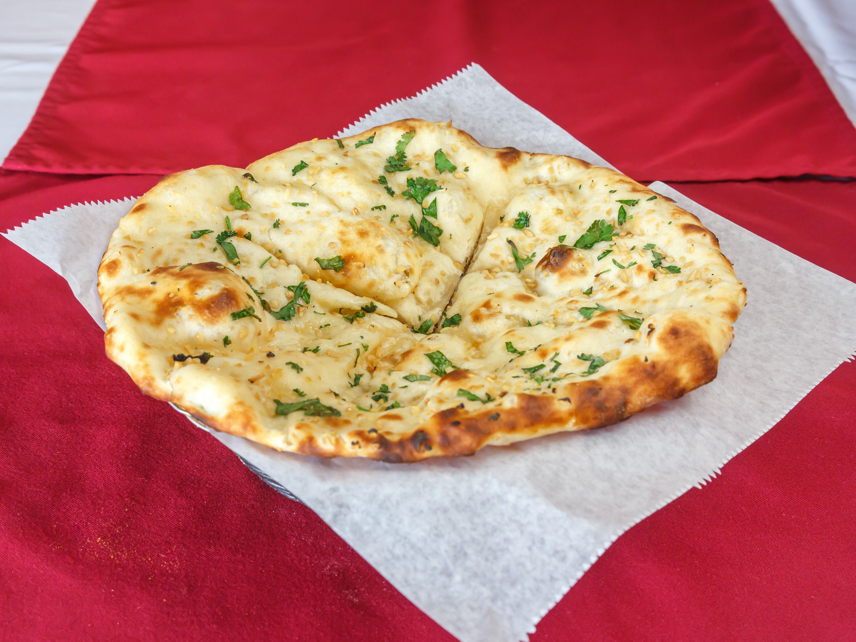 Order Garlic Naan food online from Curry House store, Smyrna on bringmethat.com