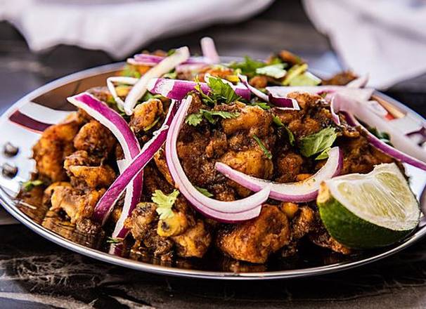 Order Dhaba Chicken food online from Gumagumalu store, Fremont on bringmethat.com