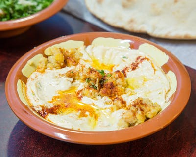 Order Hummus food online from Tarboosh Mediterranean Restaurant store, Allston on bringmethat.com