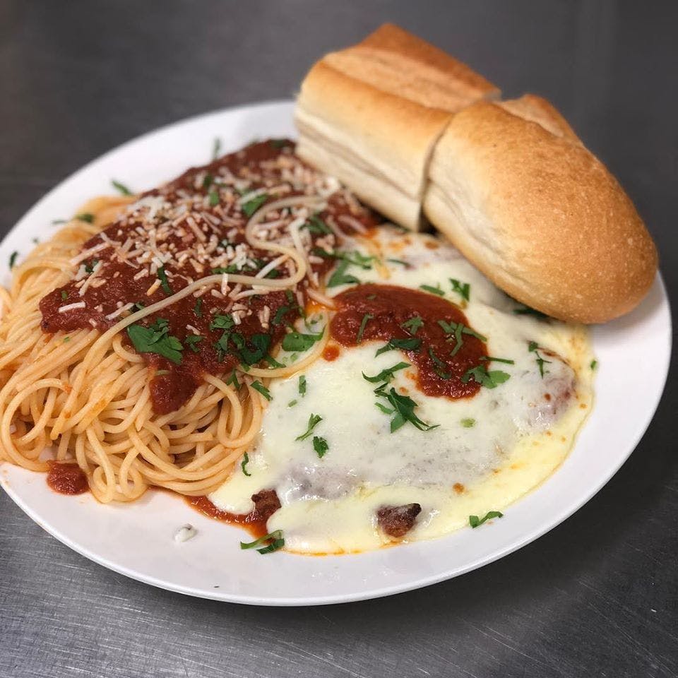 Order Chicken Cutlet Parmigiana - Entree food online from Planet Pizza store, Ridgefield on bringmethat.com