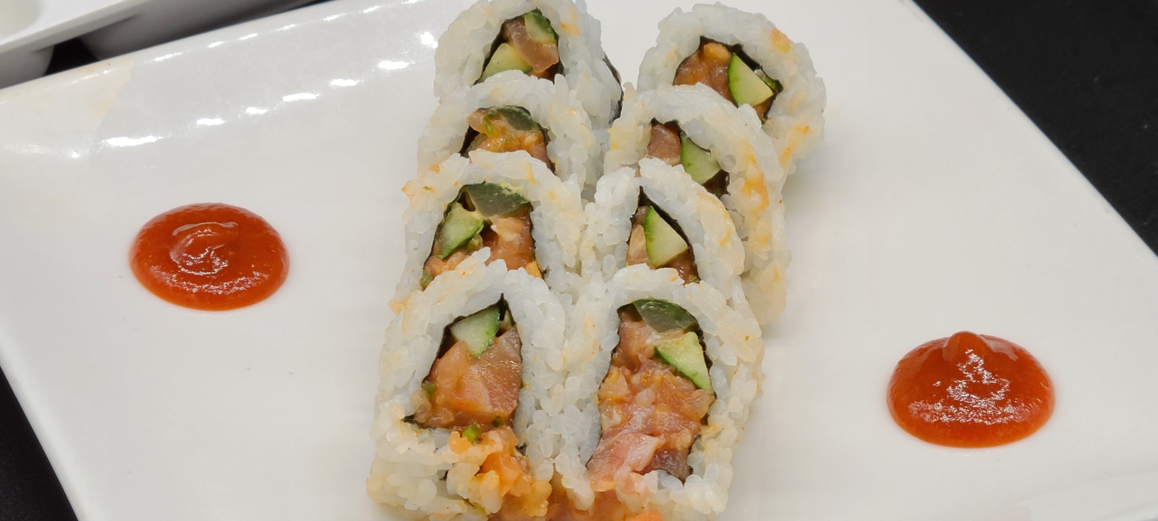Order C8. Spicy Salmon Roll(5pcs) food online from Hello Sushi store, Fullerton on bringmethat.com