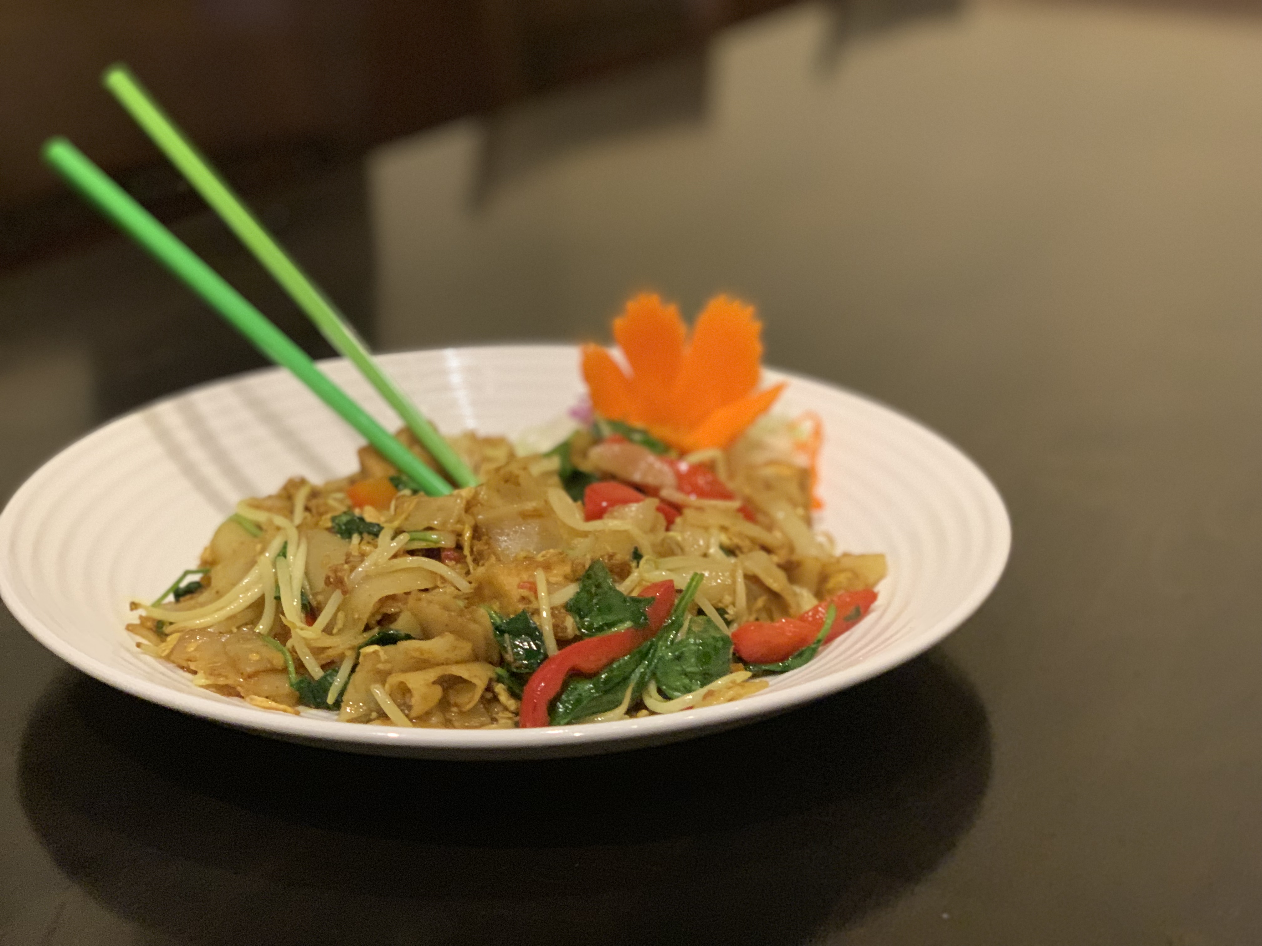 Order Turmeric Flat Noodle food online from Lemongrass Thai Eatery store, Dallas on bringmethat.com