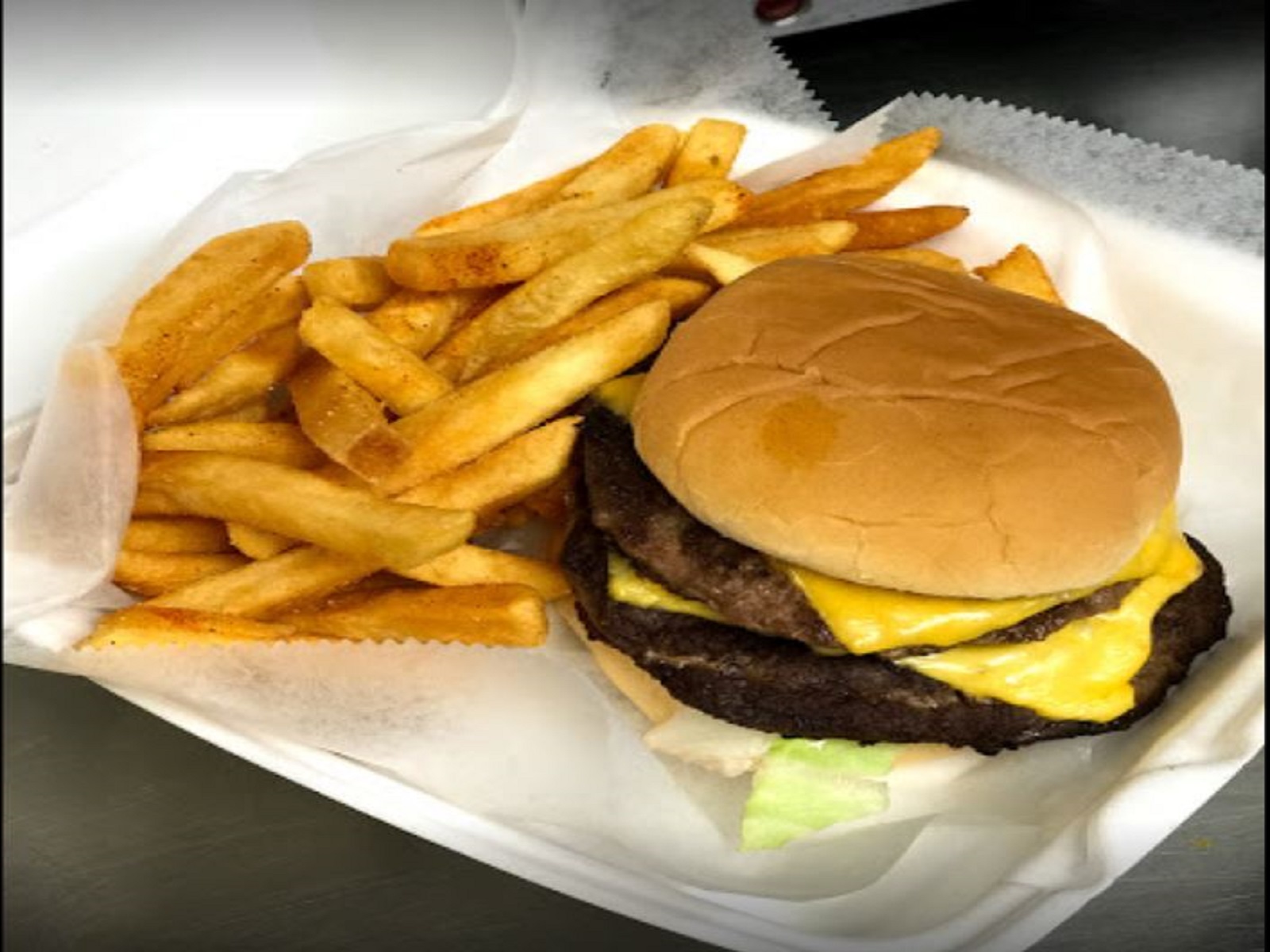 Order 19. Double Cheese Burger food online from Chicken Shack store, Greenville on bringmethat.com