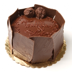 Order 7" Chocolate Truffle Cake food online from Tiffany's Bakery store, Philadelphia on bringmethat.com