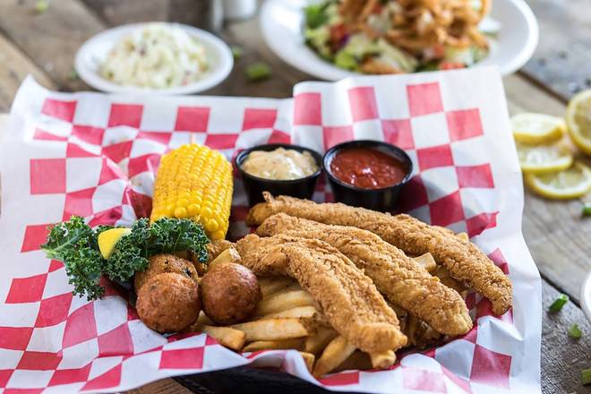 Order CATFISH BASKET food online from Razzoo's store, Irving on bringmethat.com