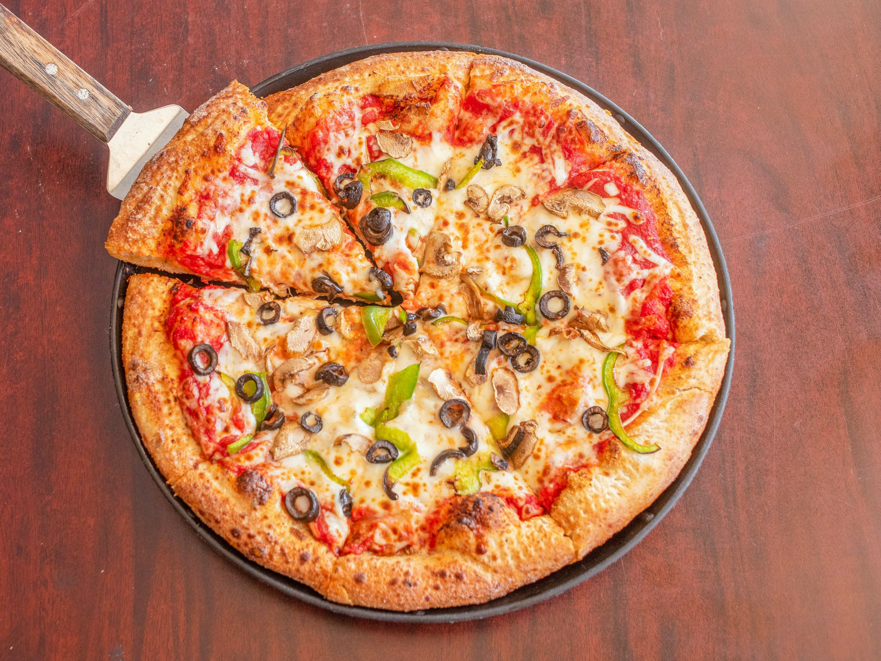Order The Garden Pizza food online from Greeks Pizzeria store, Crawfordsville on bringmethat.com
