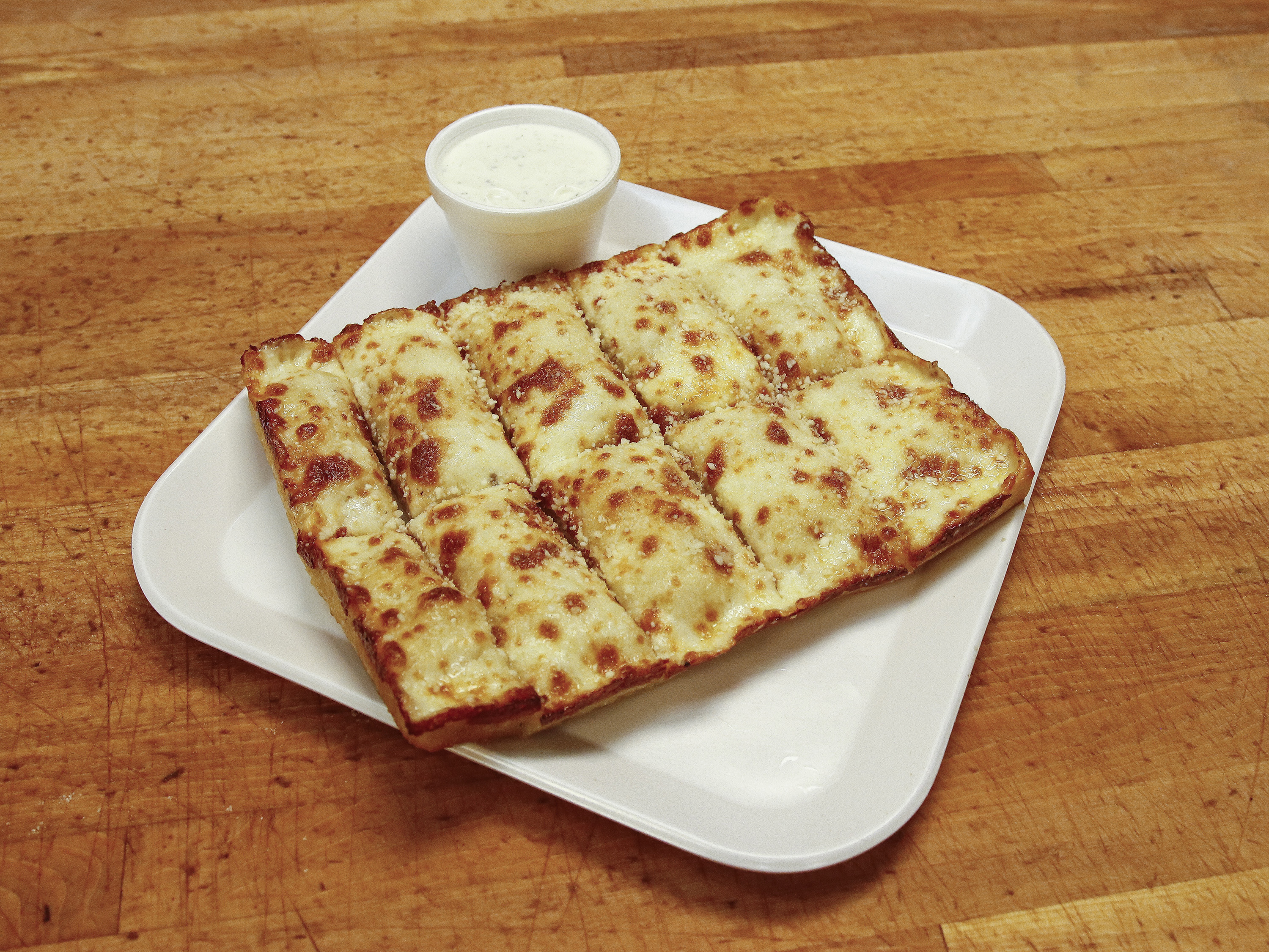 Order Cheesy Bread food online from Sorrento Pizza store, Clinton Township on bringmethat.com