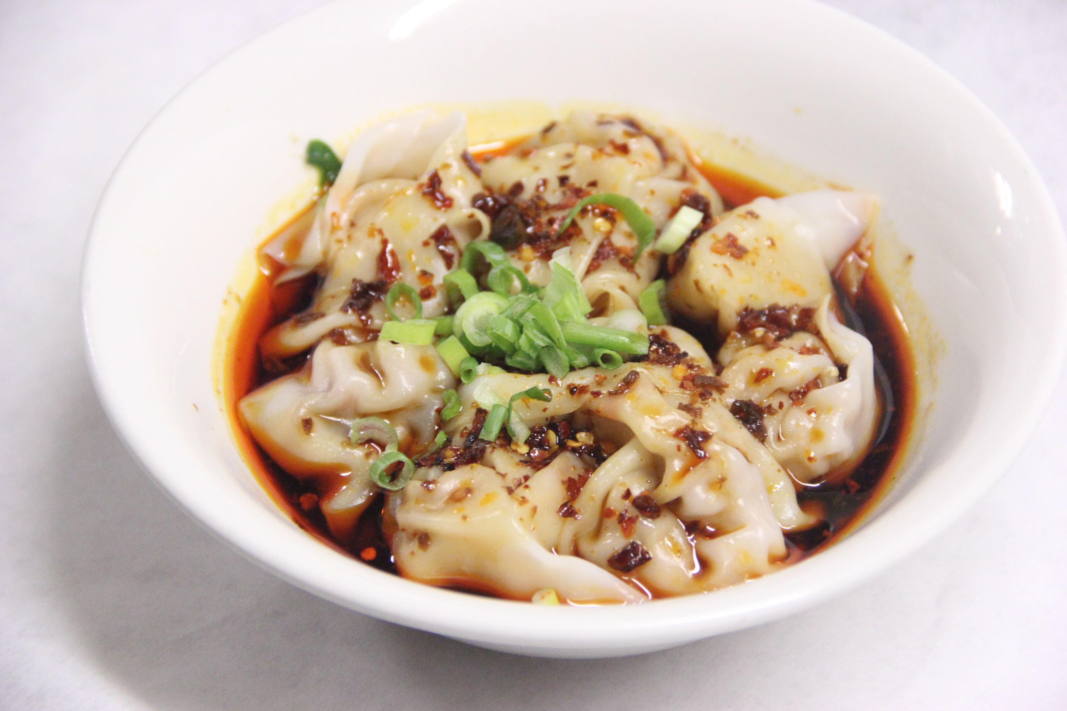 Order 10 Sichuan Wontons 红油龙抄手 food online from Chengdu Impression store, Chicago on bringmethat.com
