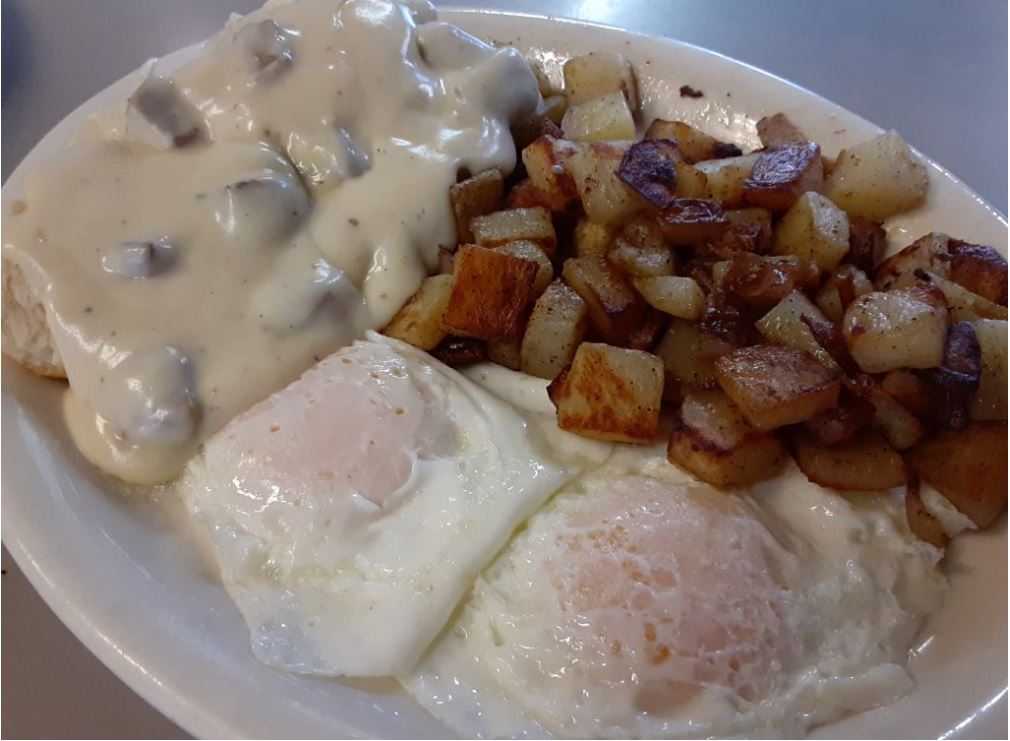 Order Half Order of Biscuits & Gravy served with Two Eggs & breakfast potatoes food online from Potato Shack Cafe store, Encinitas on bringmethat.com