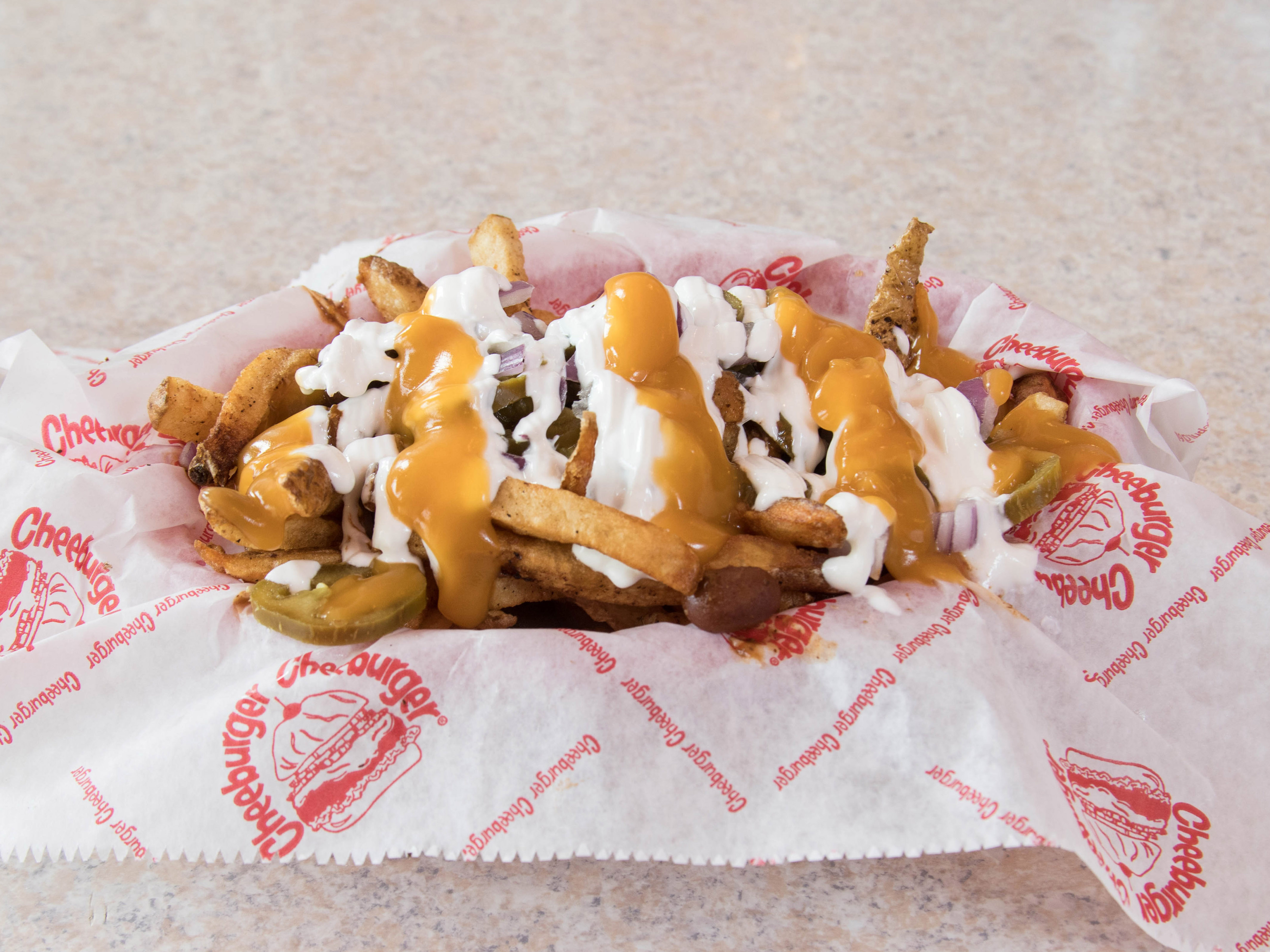 Order Loaded Chili Cheese Fries food online from Cheeburger Cheeburger store, Saint Louis on bringmethat.com