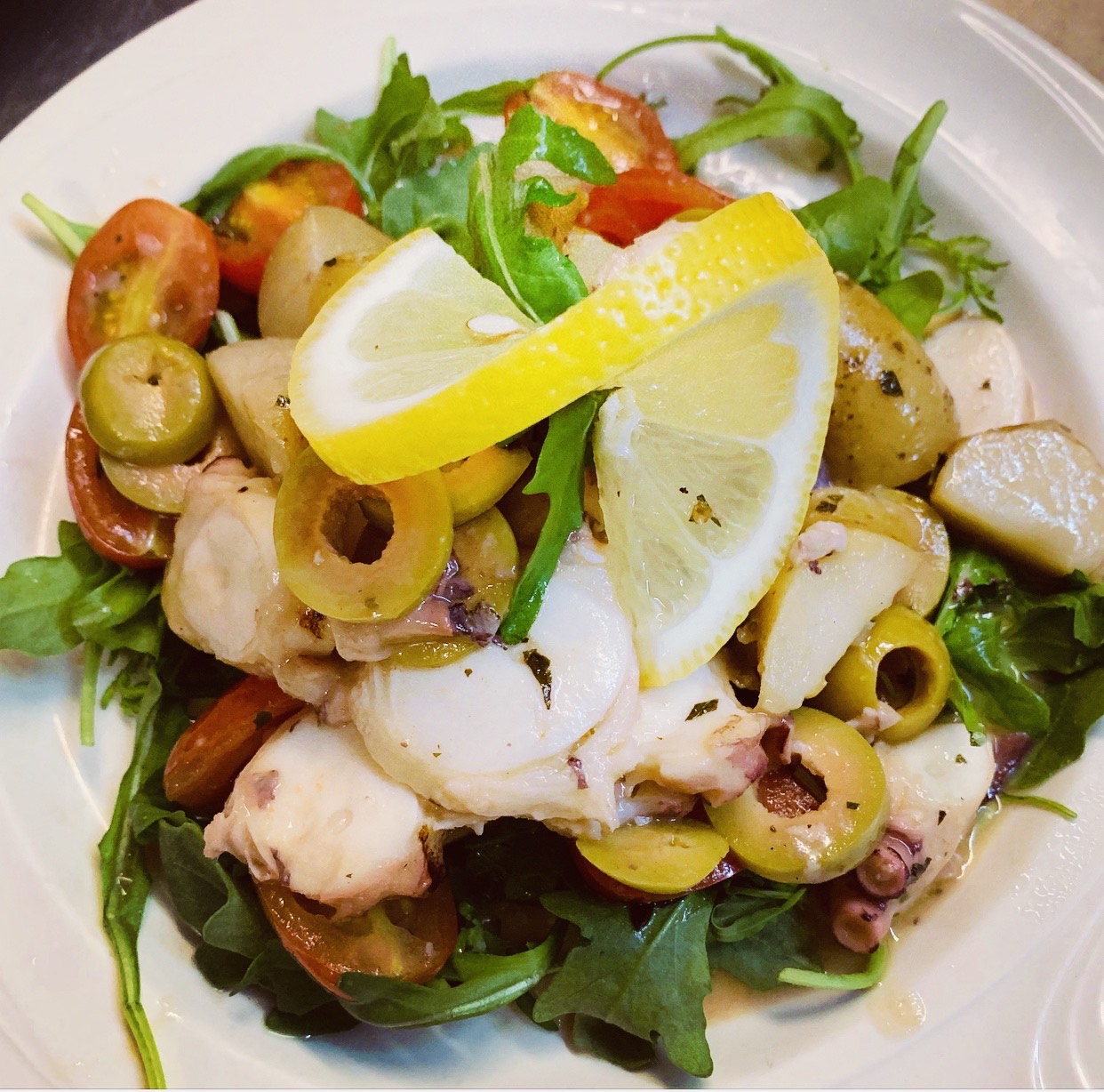Order Grilled octopus food online from Jilly's Cafe store, Evanston on bringmethat.com