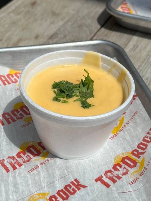 Order Side Queso food online from Taco Rock store, Falls Church on bringmethat.com
