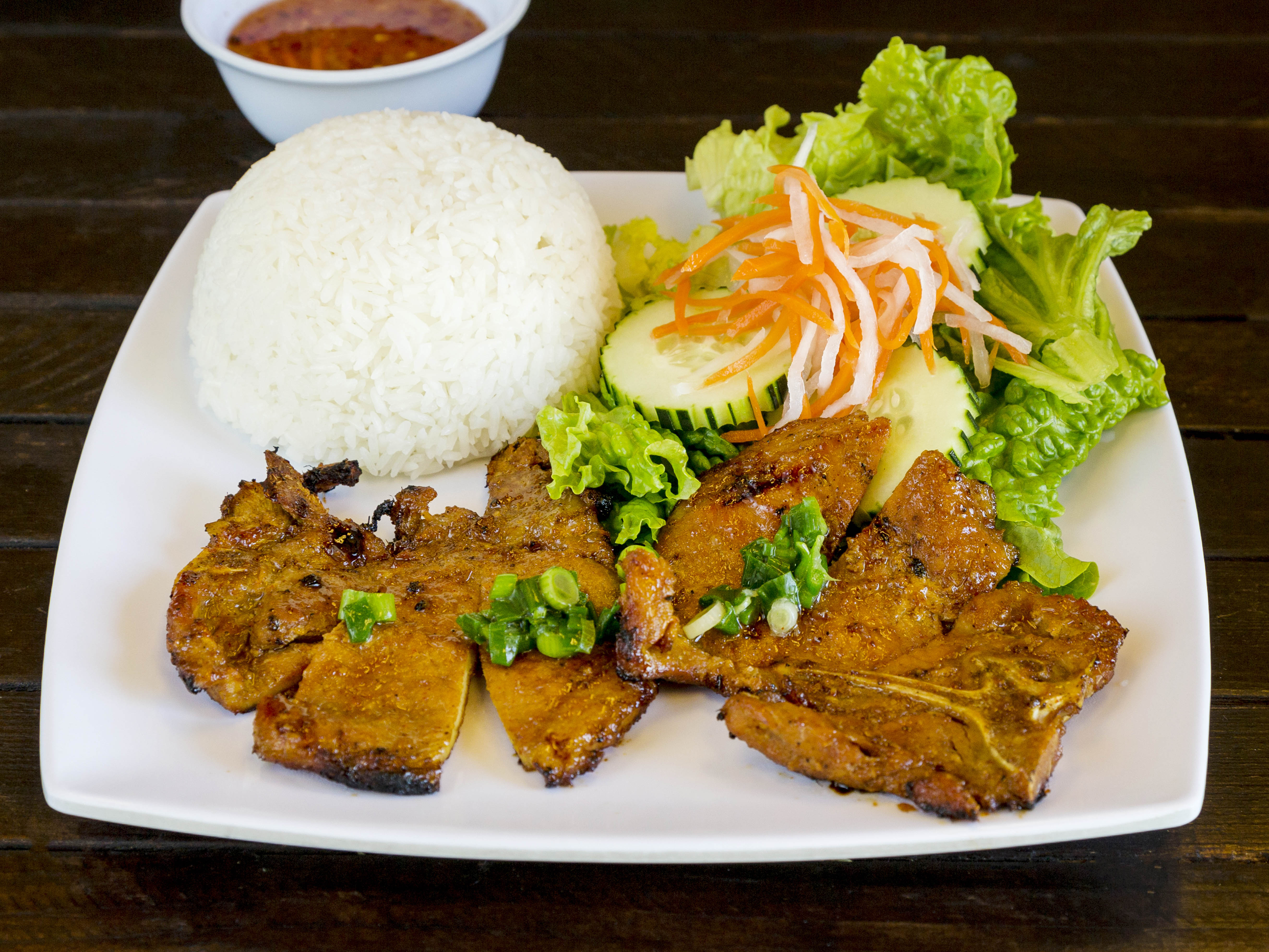 Order 21. Charbroiled Pork Chop food online from Pho Dam store, Chandler on bringmethat.com
