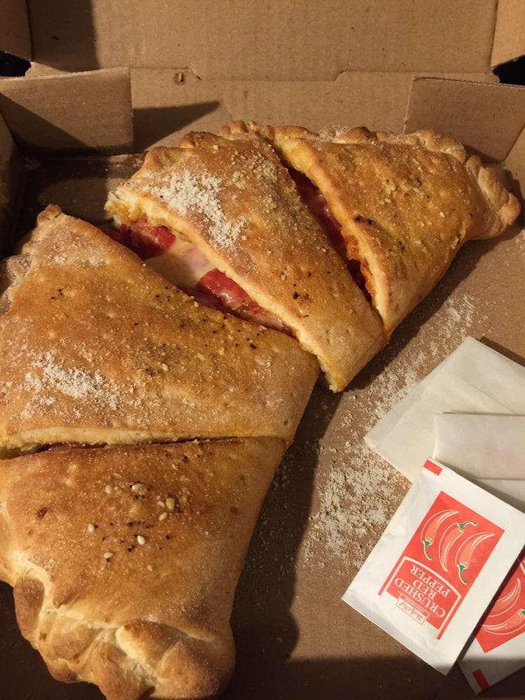 Order Calzone with One Topping - Calzone food online from Fiesta Pizza store, Riverside on bringmethat.com