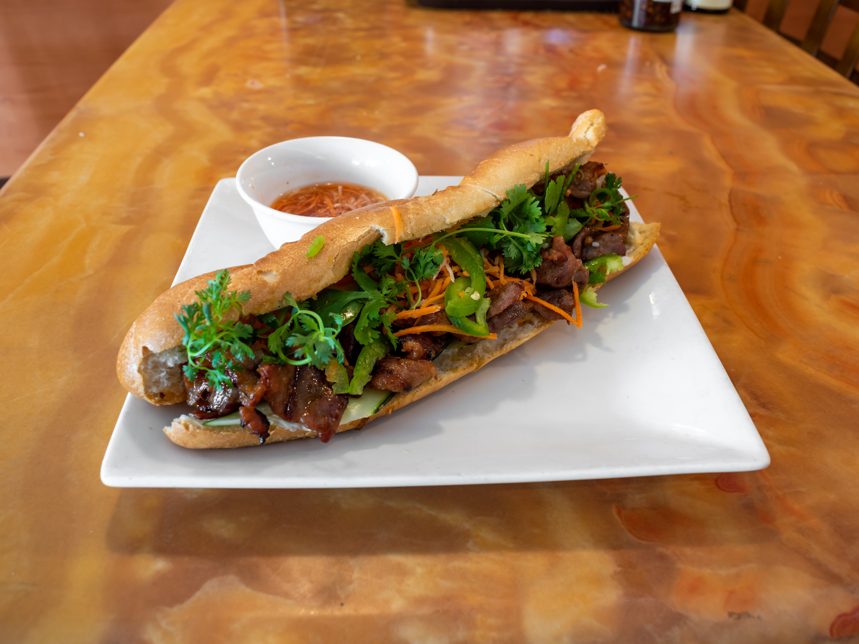 Order 81. Banh Mi Ga Nuong food online from Pho Of The Desert store, Indio on bringmethat.com