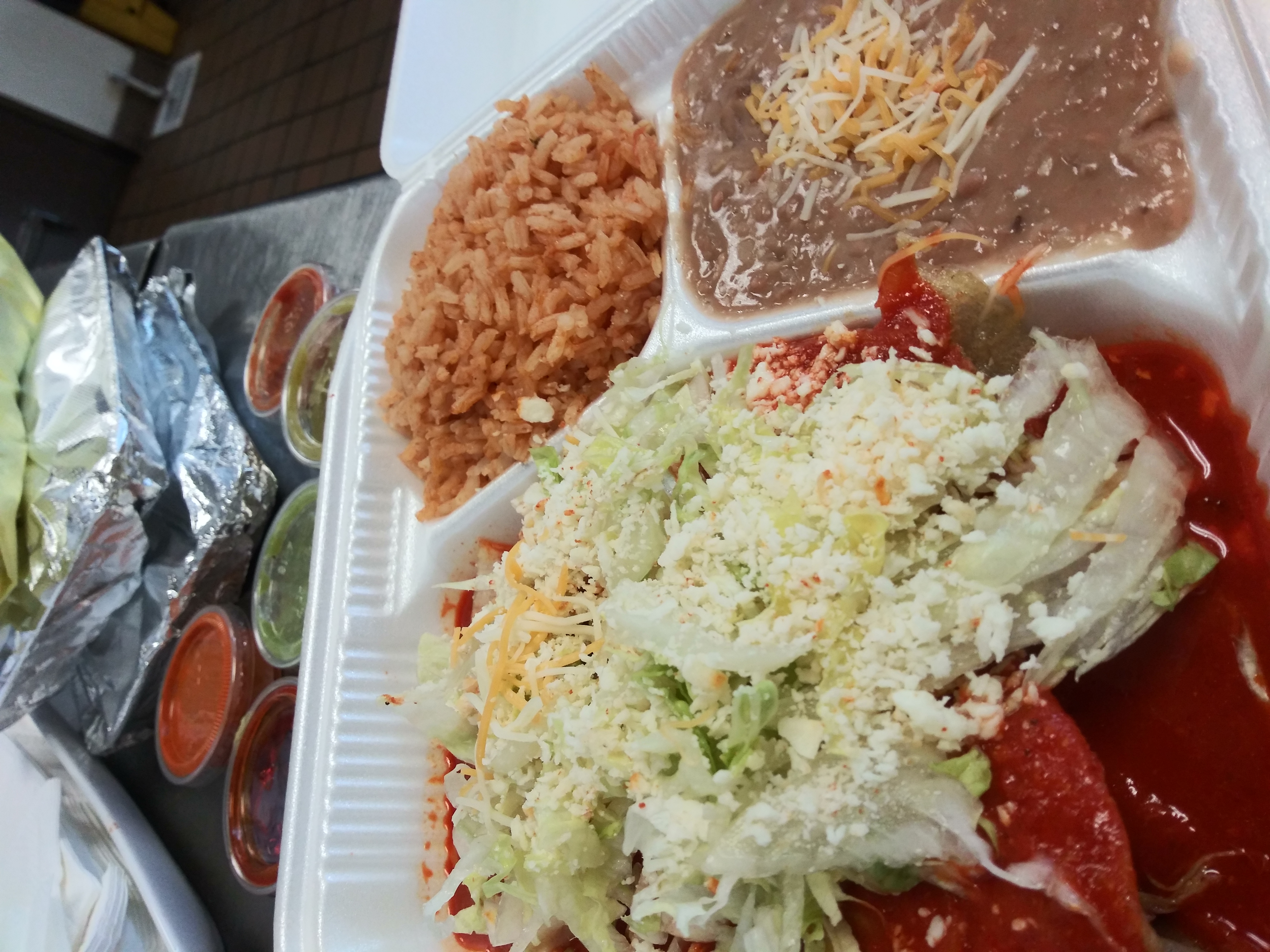 Order 2 Chicken Enchilada Rice and Beans Combo Plate food online from Cilantro Taco Shop store, La Mesa on bringmethat.com