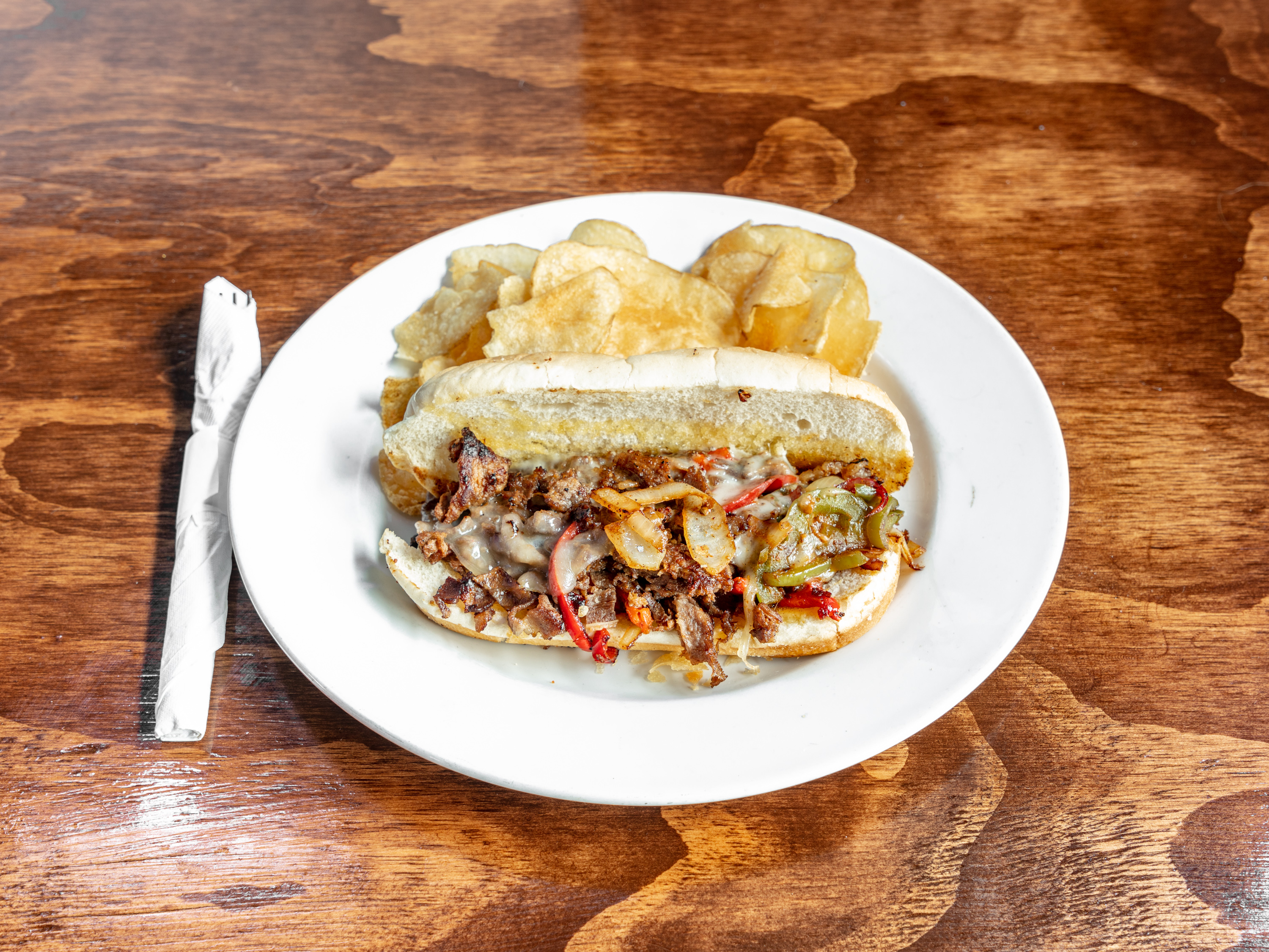 Order Philly Cheese Steak Sandwich food online from Tailgaters Bar & Grill store, Plano on bringmethat.com