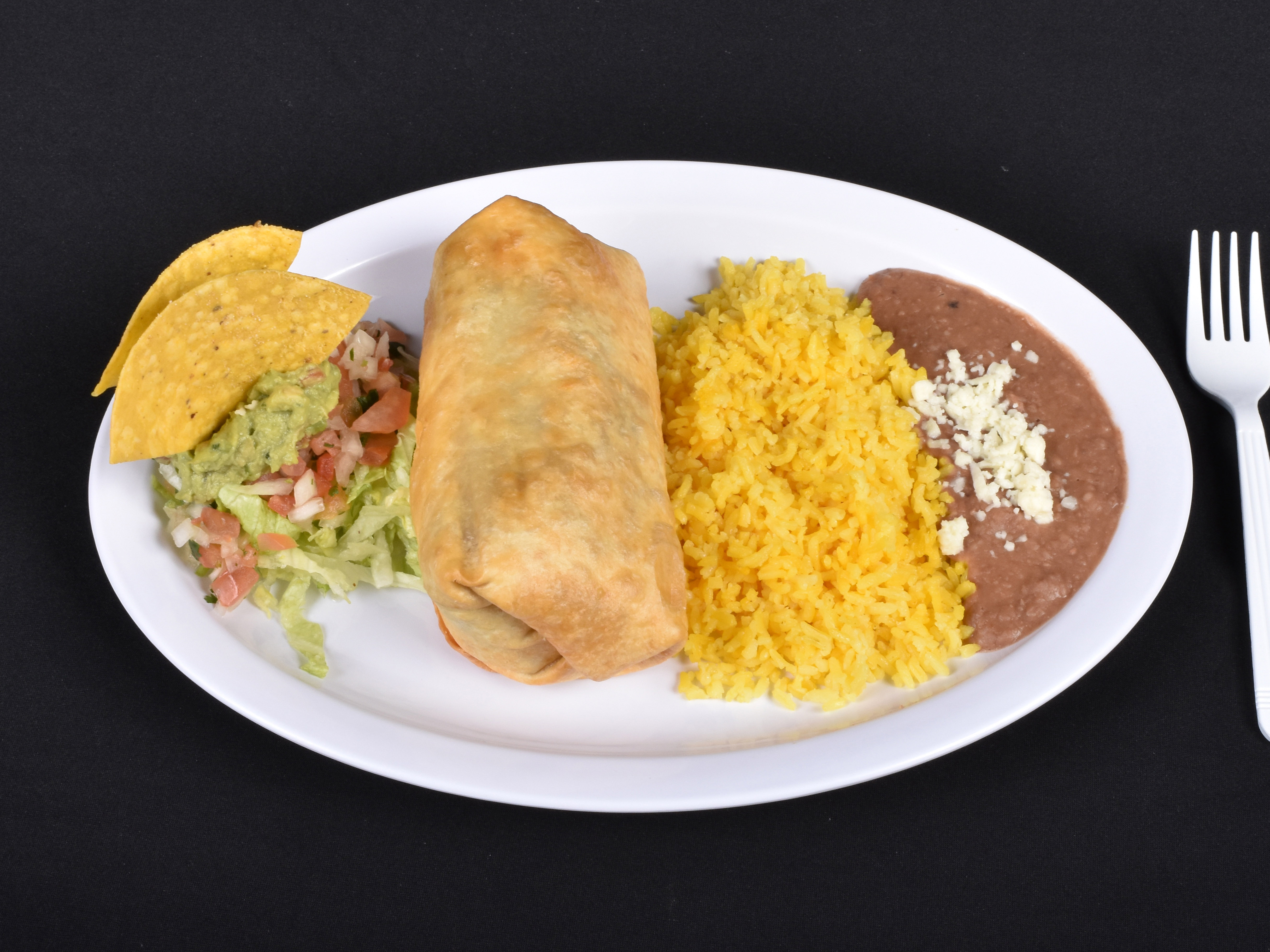 Order CHICKEN CHIMICHANGA food online from Tabasco Mexican Grill store, Ossining on bringmethat.com