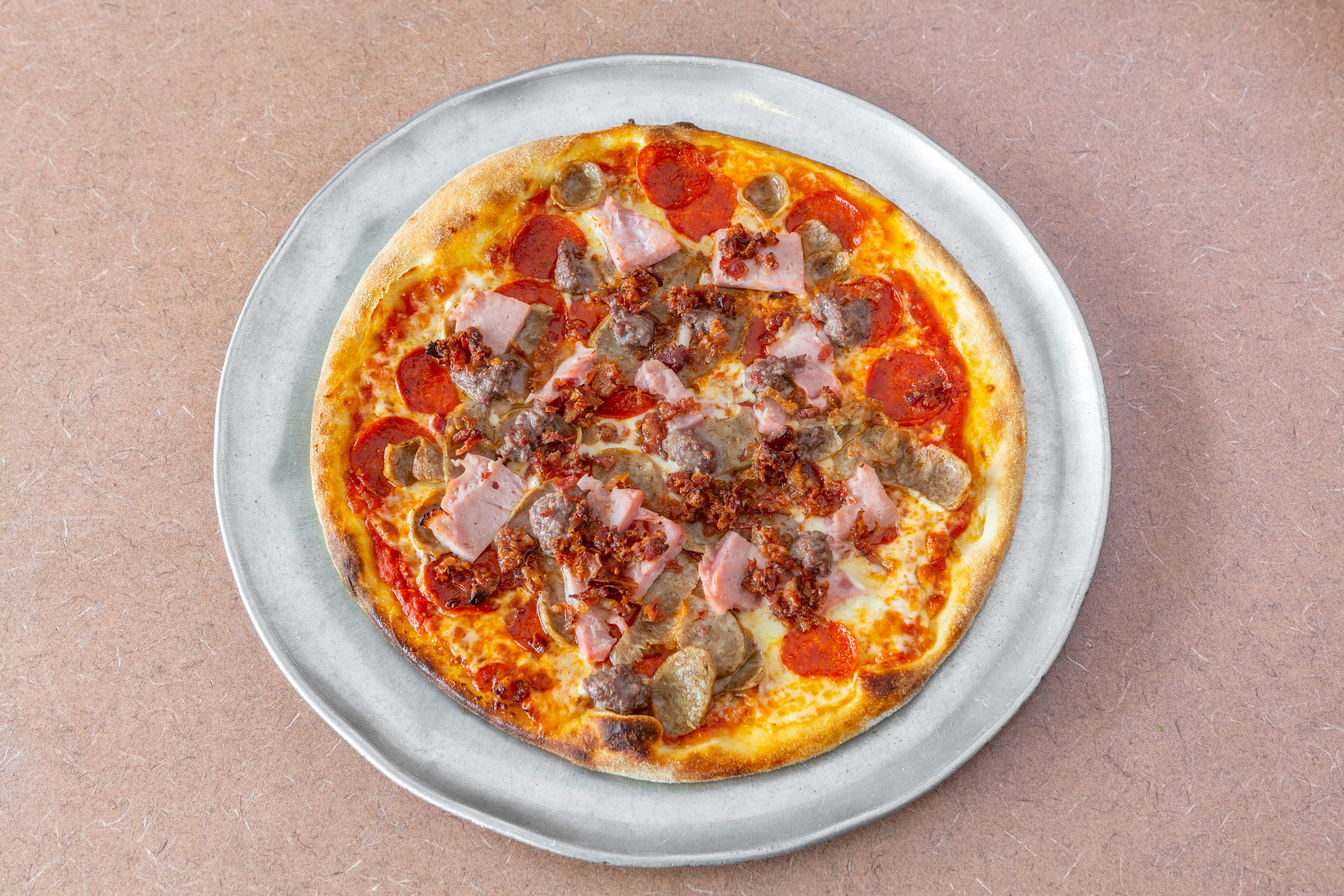 Order Meat Lover's Pizza - Medium 12'' food online from Wellesley North End store, Wellesley on bringmethat.com