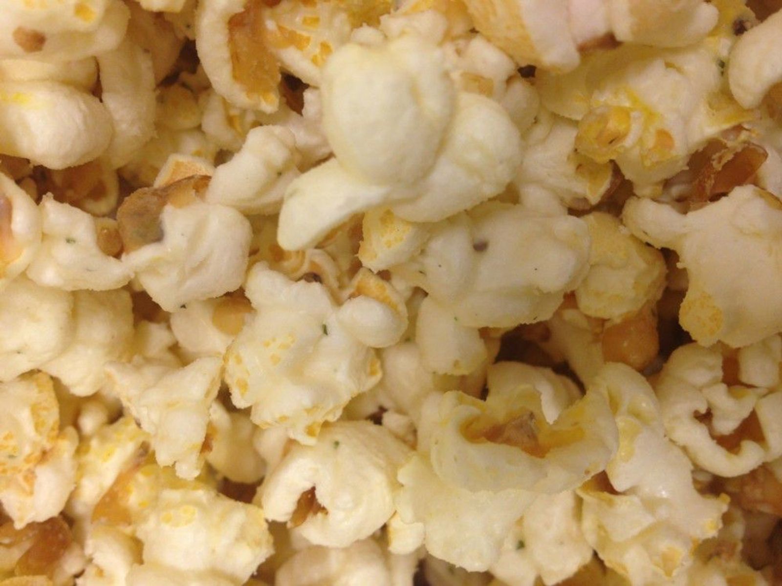 Order DILL PICKLE food online from Poparazzis Popcorn store, Houston on bringmethat.com