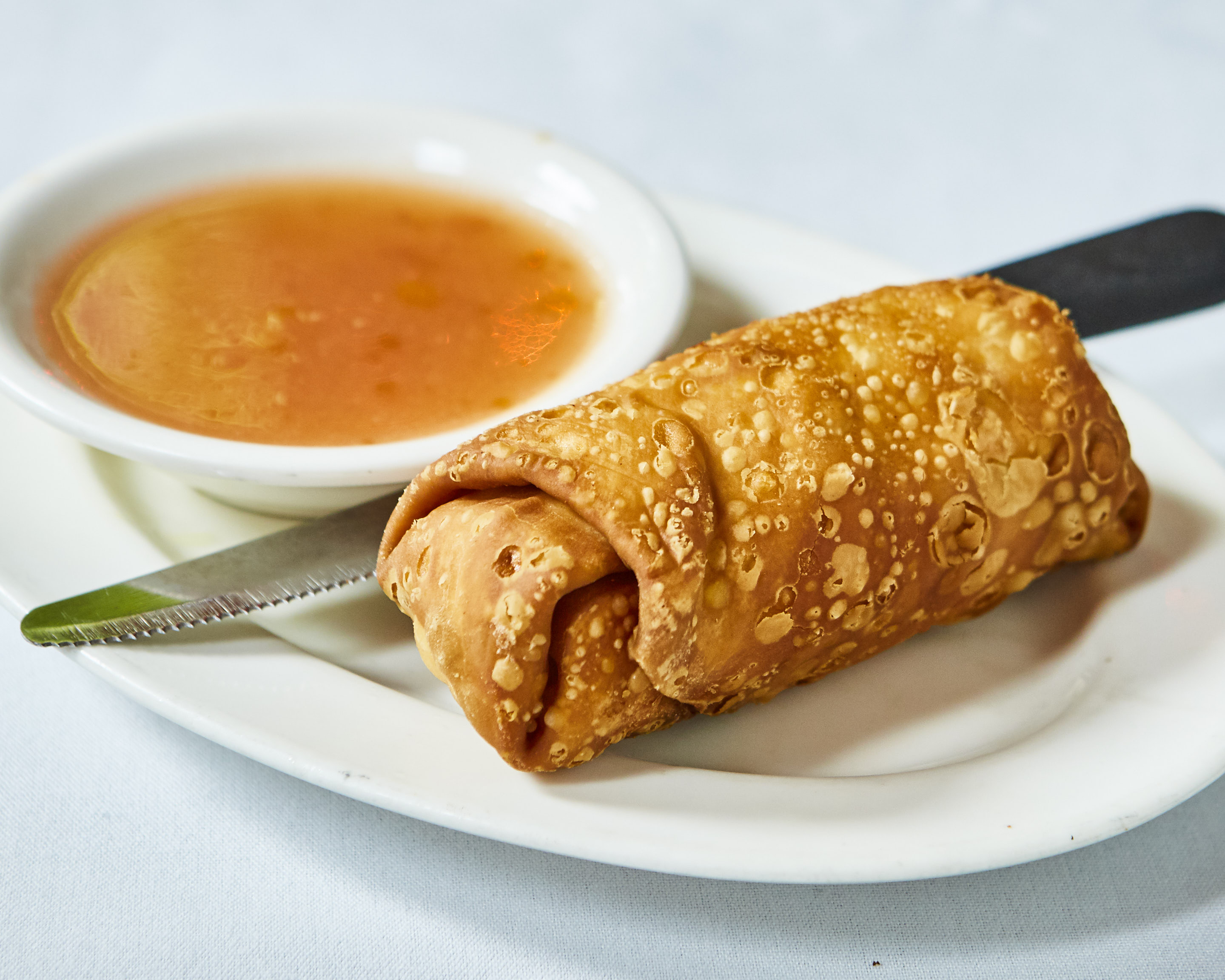Order A2. Fried Egg Roll (1) food online from Ollie's Noodle Shop & Grille store, New York on bringmethat.com