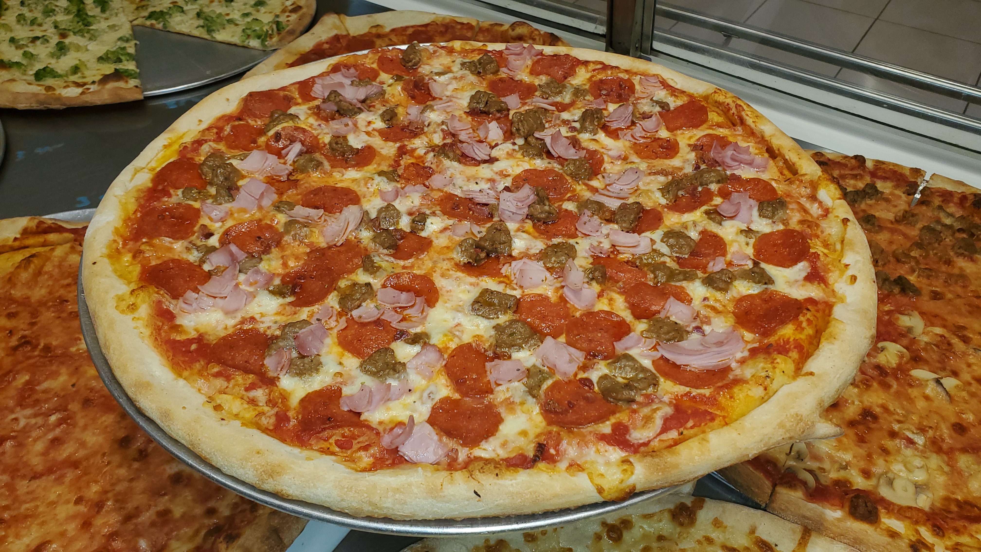Order Meatlovers food online from Villa Pizza store, Clifton Park on bringmethat.com