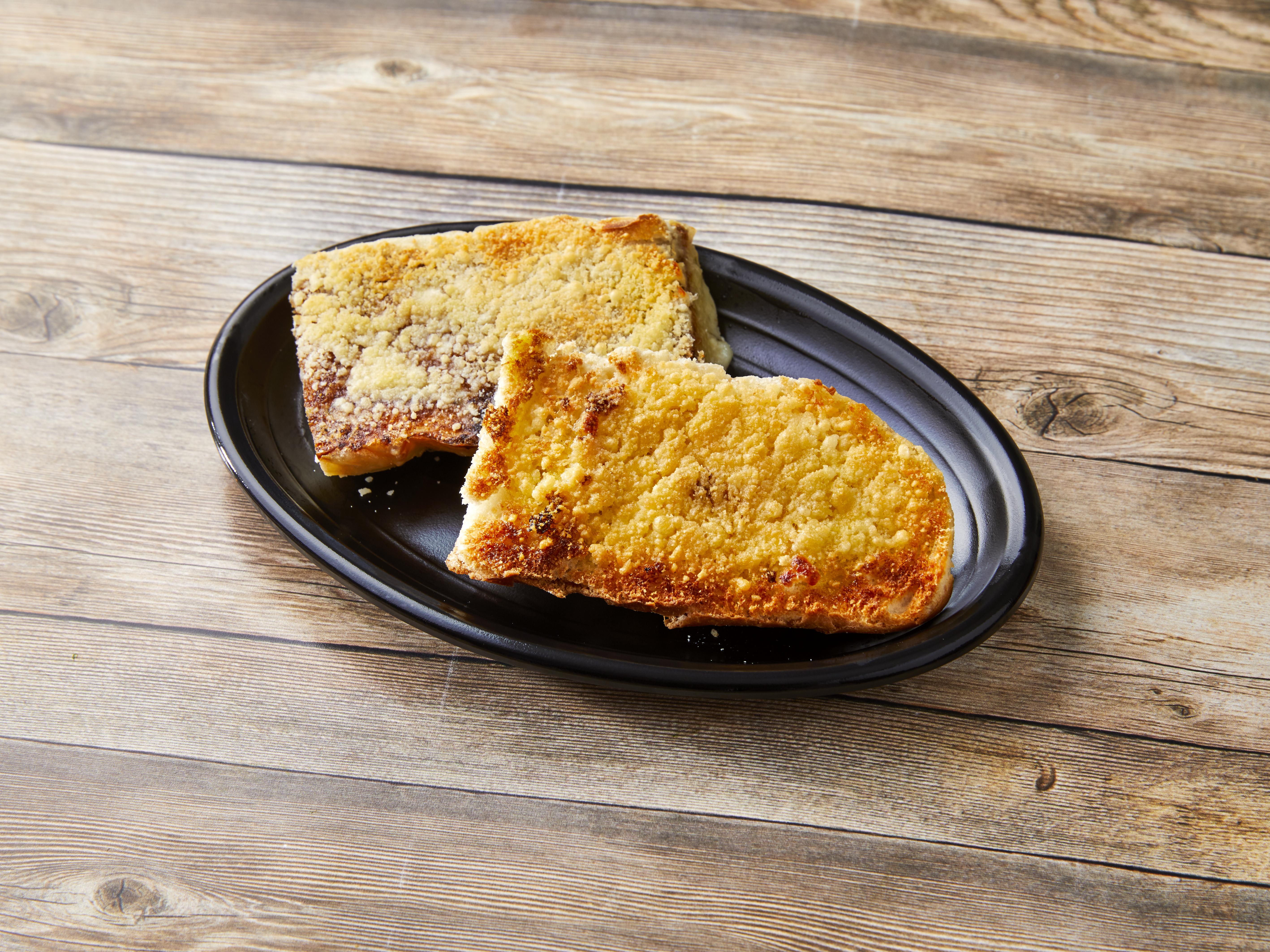 Order Garlic Bread with Cheese food online from Panino's Restaurant store, Rockford on bringmethat.com