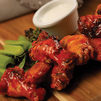 Order Buffalo-Wings food online from Brixx Wood Fired Pizza store, Greensboro on bringmethat.com