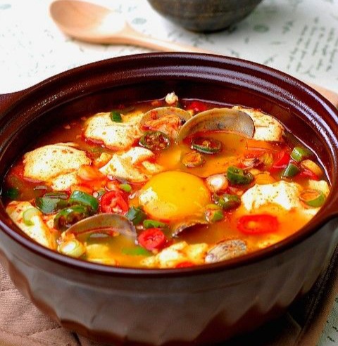 Order Spicy Seafood Tofu Soup  food online from Tomo Sushi store, Laguna Woods on bringmethat.com
