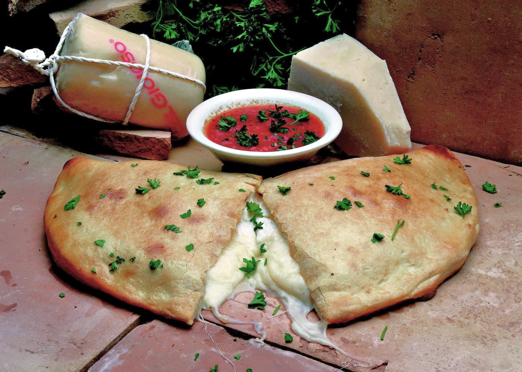Order Traditional Cheese Calzone | Large food online from Big Apple Pizza store, Port Saint Lucie on bringmethat.com