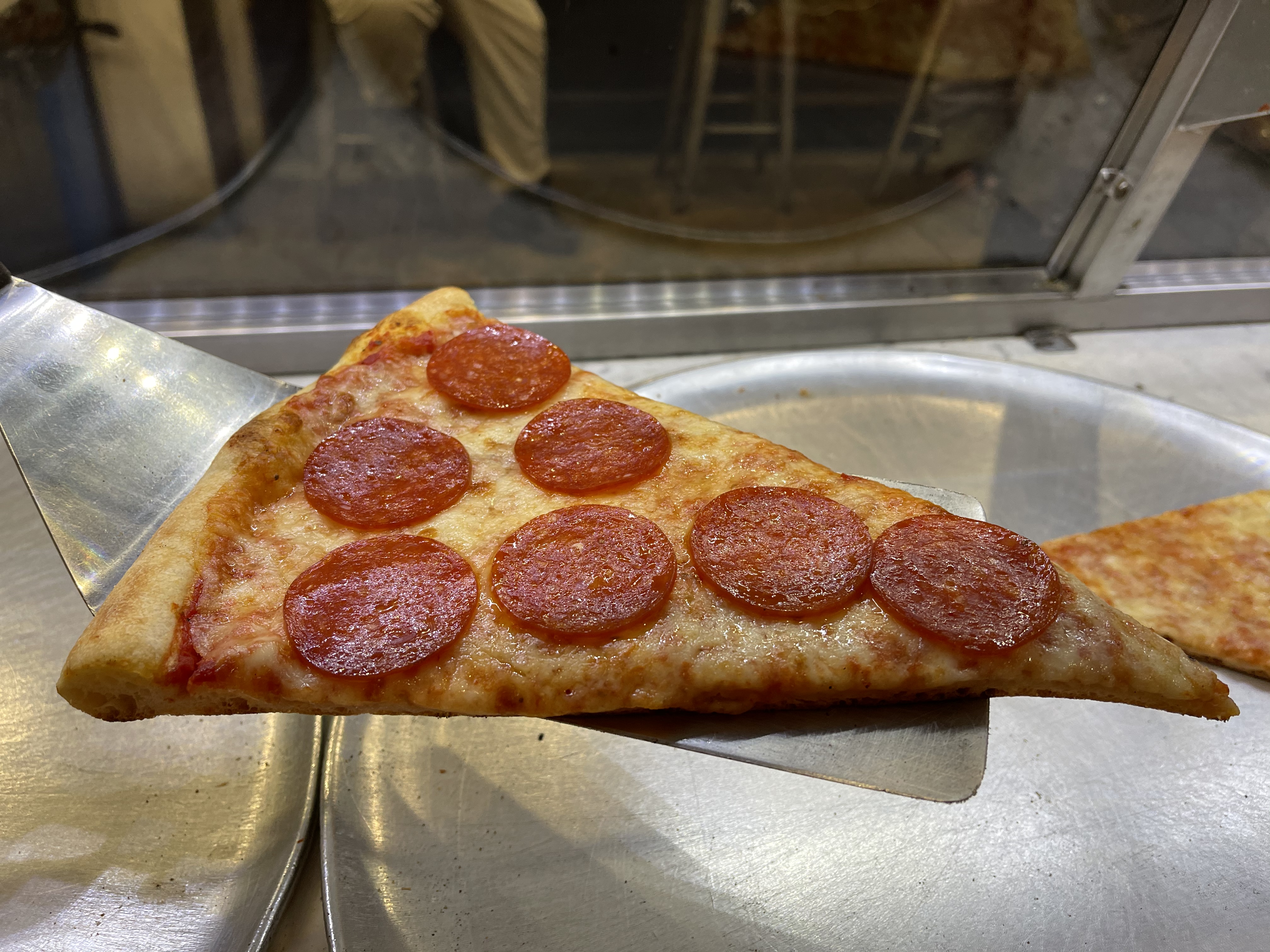 Order Pepperoni Pizza Slice food online from Famous famiglia pizza store, New York on bringmethat.com